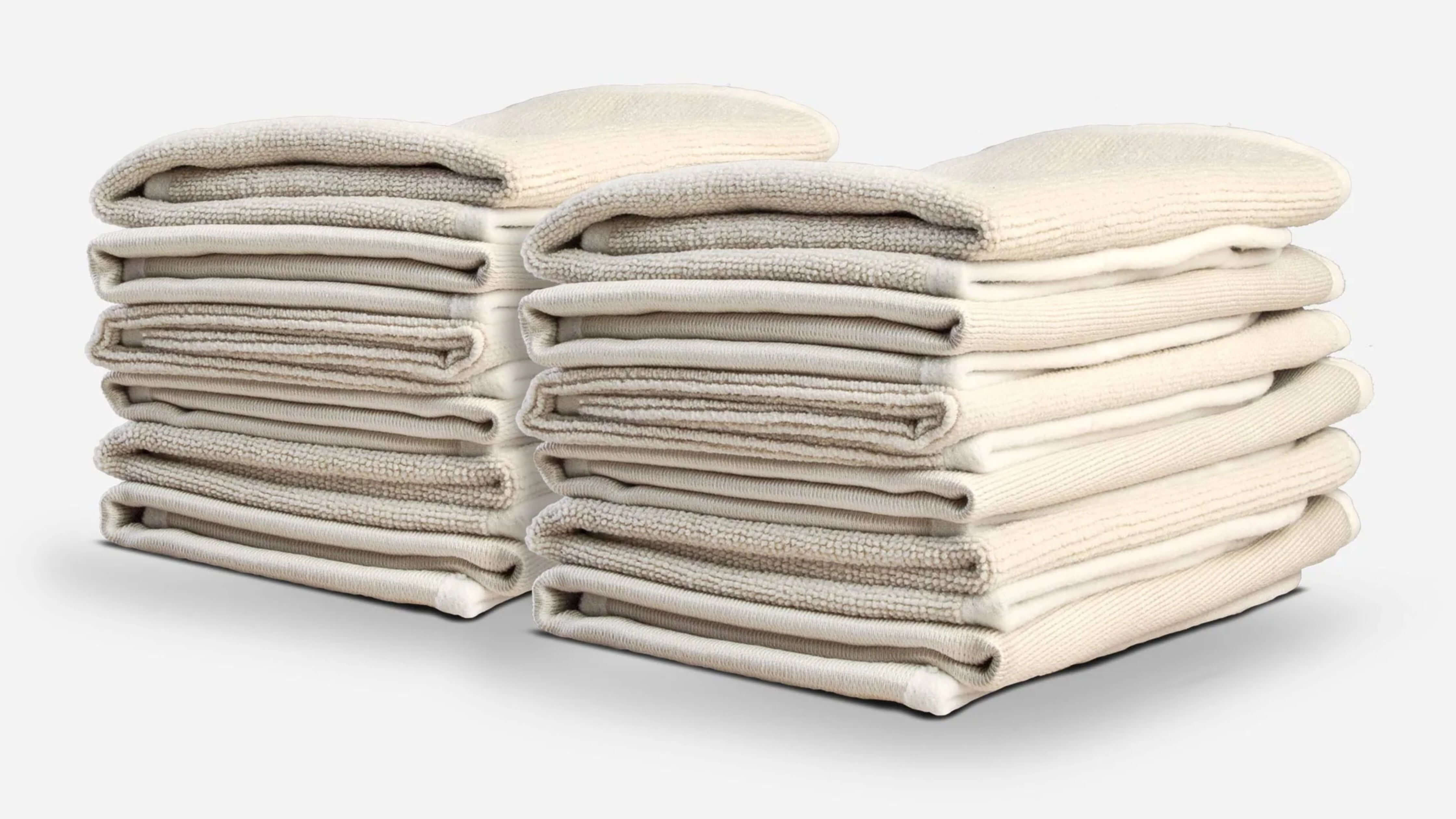 Close-up of a folded, soft, gray, fluffy fabric, ideal for cleaning glasses.