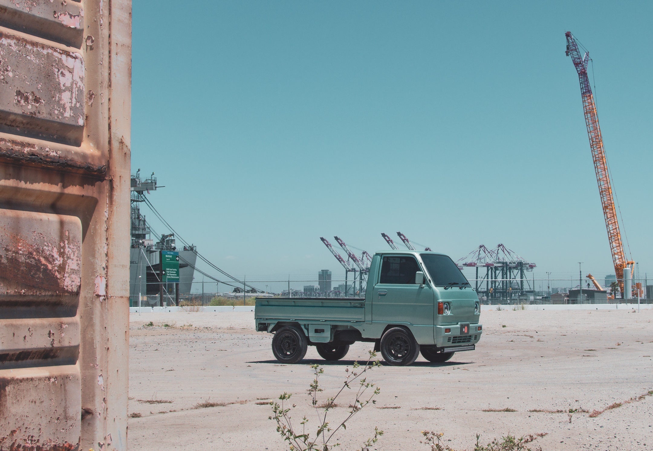 Subaru Sambar Van, an iconic vehicle known for reliability and cultural significance, in a scenic setting.