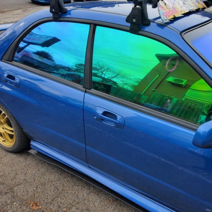 Car window tint showcasing UV protection and privacy, enhancing vehicle style and comfort with premium automotive film.
