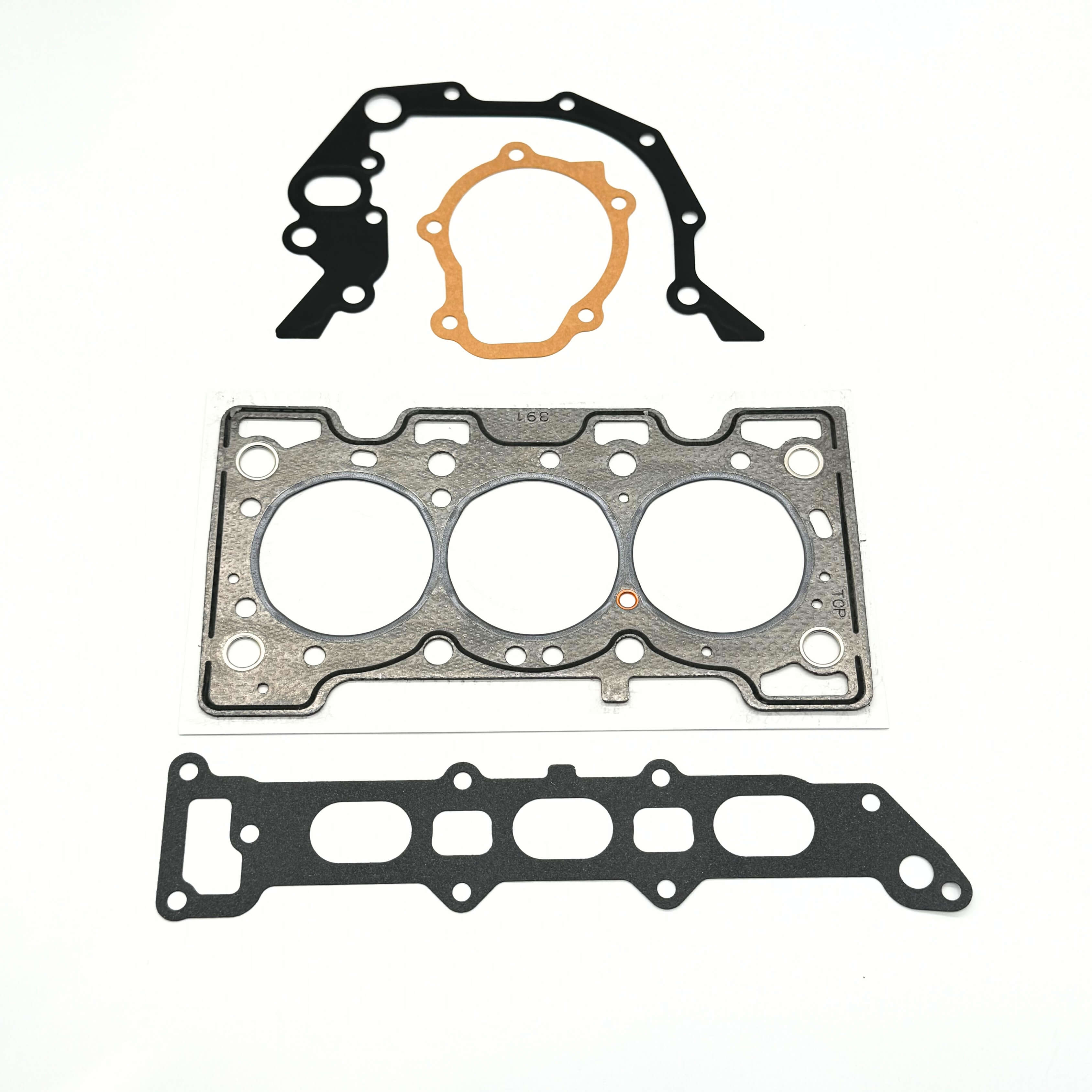 Engine head gasket set for Mitsubishi Minicab Van U61W, U62W (1999–2011) with 3G83 engine, includes head, intake, and water pump gaskets for full rebuilds.