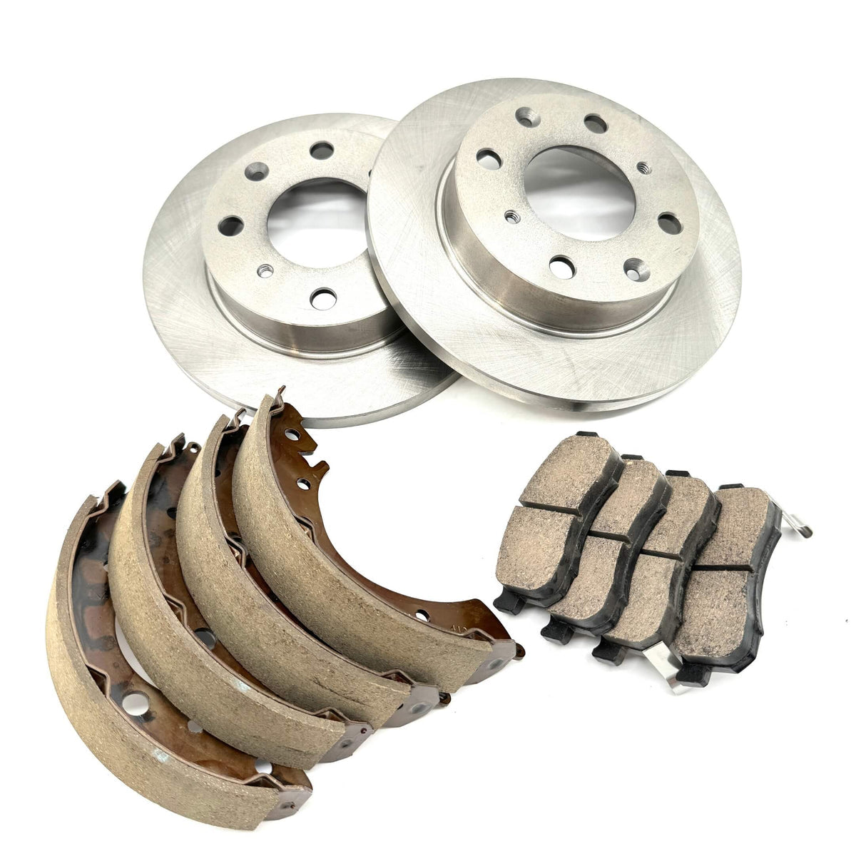 Complete brake kit for Honda Acty Truck HA3, HA4 models (1990-1999), including brake rotors, pads, and shoes for optimal braking performance and reliability.