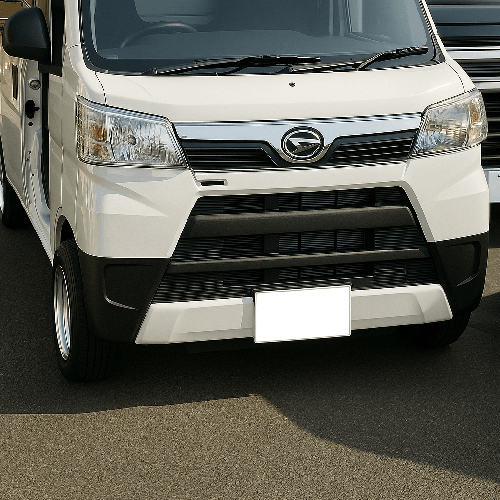 White 2007–2015 Daihatsu Hijet Van S321/S331 front view showcasing a custom exterior body kit with sculpted front bumper lip and flush alloy wheels for Japanese kei van styling.