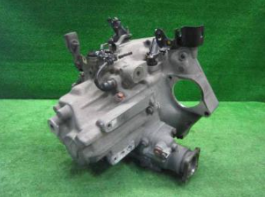 Honda Acty Transmission for HA3 and HA4 models (1990-1999), featuring robust design with visible mounting points and gears, ideal for maintaining vehicle performance.
