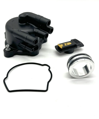 Close-up of Honda Acty Van distributor replacement kit including distributor cap, rotor, gasket, and collar for HH3, HH4 models (1990-1999).