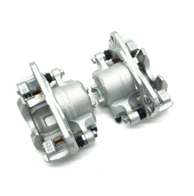 Pair of silver replacement brake calipers for Honda Acty HH5 and HH6 models (1999-2009), providing reliable braking performance and durability.