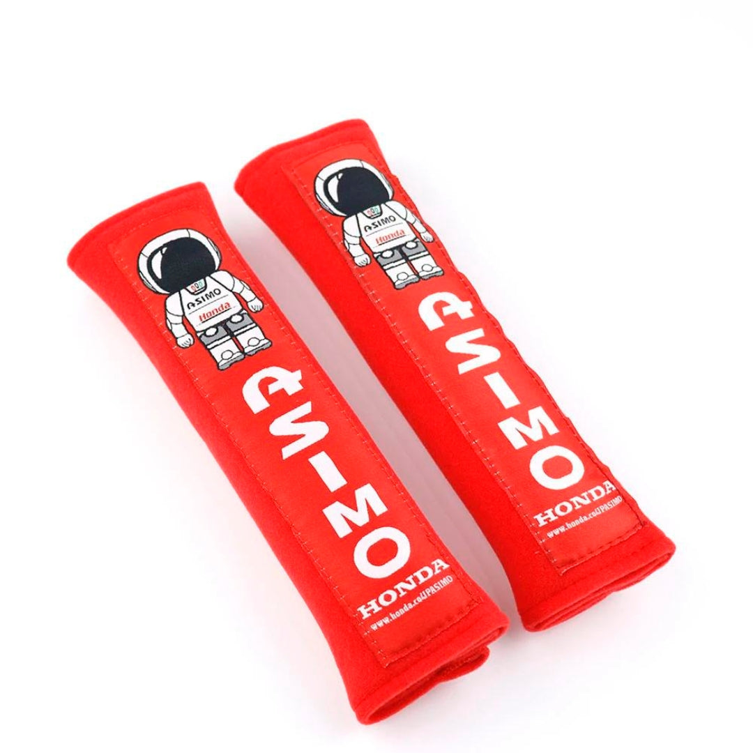 Red Mugen Honda-branded seatbelt covers, designed for Kei trucks and JDM cars, offering comfort and style, part of Oiwa Garage's quality brand accessories for mini trucks.