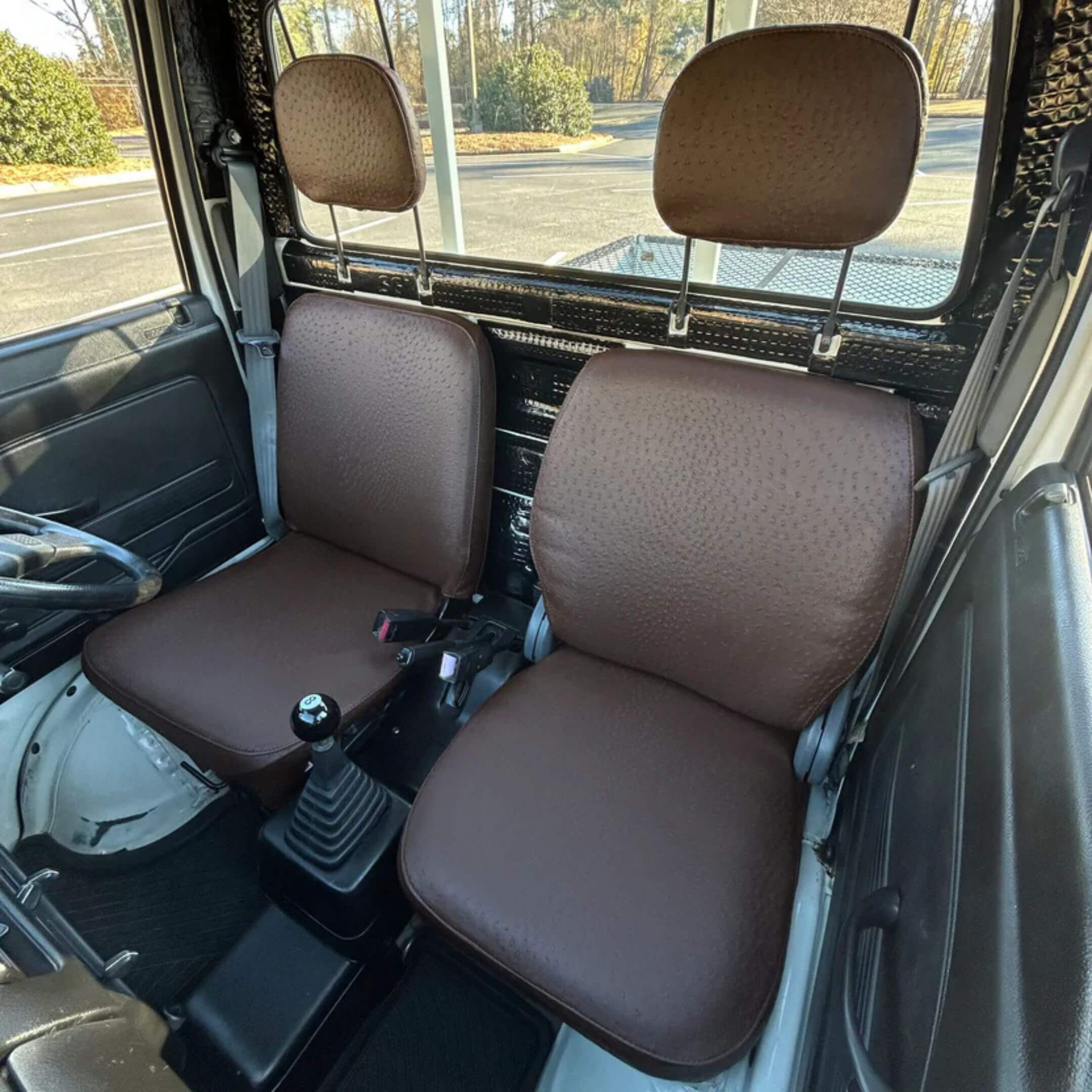Honda Acty Seat Covers in Cocoa Brown Ostrich for Driver and Passenger, designed for HA3 and HA4 models from 1990-1999, featuring a textured finish.