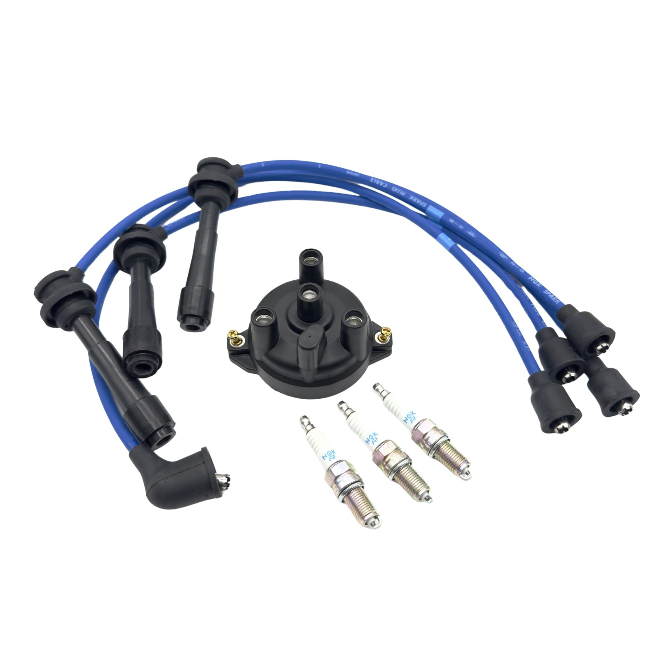 Eight piece ignition kit for Suzuki Carry DC51T and DD51T 1991 to 1999, showing distributor cap, three NGK spark plugs, and blue spark plug wires arranged on a white background for a full engine tune up.