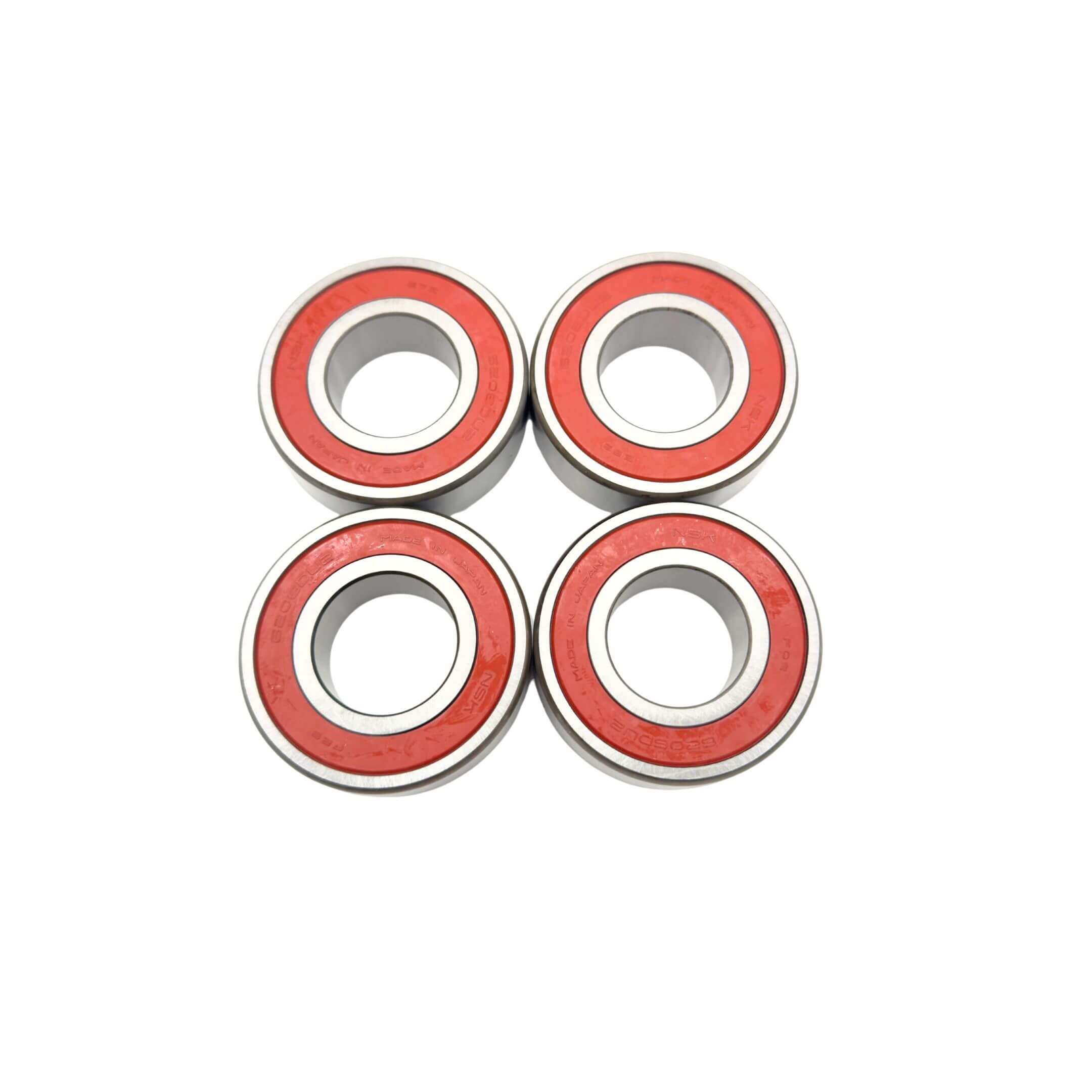 Front Wheel Bearing Complete Kit for Daihatsu Hijet and Atrai models (1988-1999) featuring durable red-sealed bearings for both driver and passenger sides.