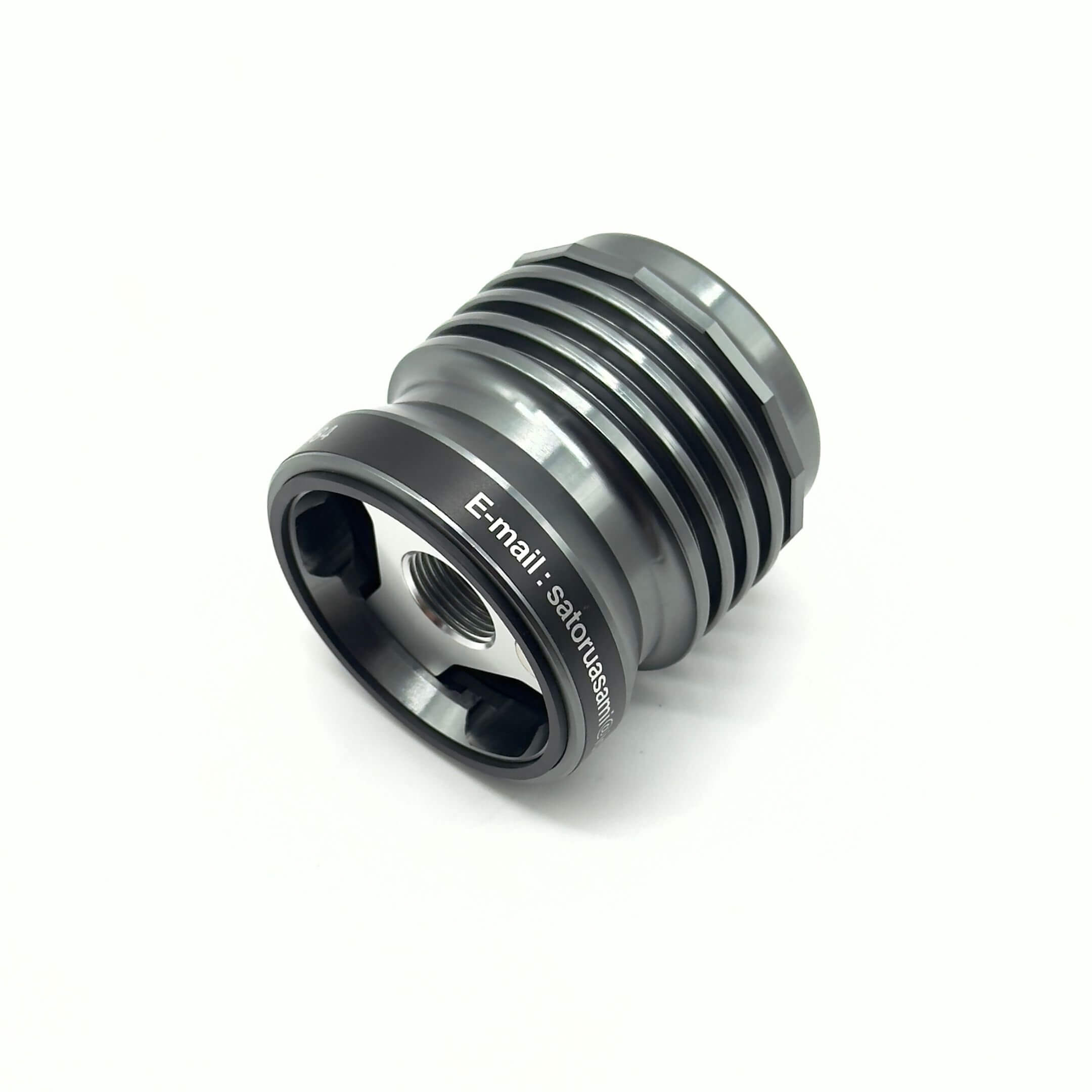 Asami Engineering Racing Oil Filter for Honda Acty Models (1990-2012) featuring a sleek, metallic design with visible threading and contact information.