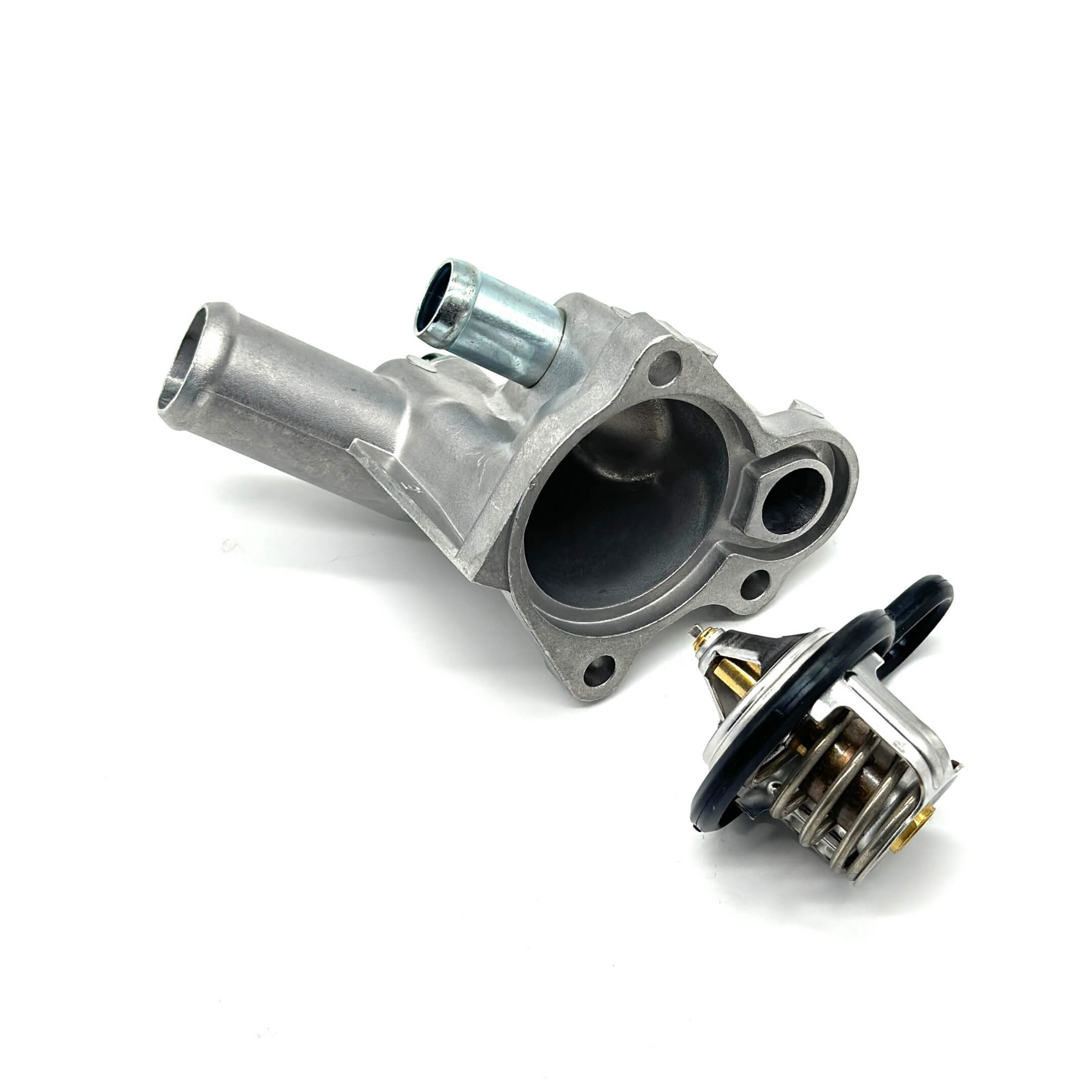 Thermostat and housing for Honda Acty Truck HA8, HA9 models (2009-2022), featuring a durable metal construction with a silver finish.