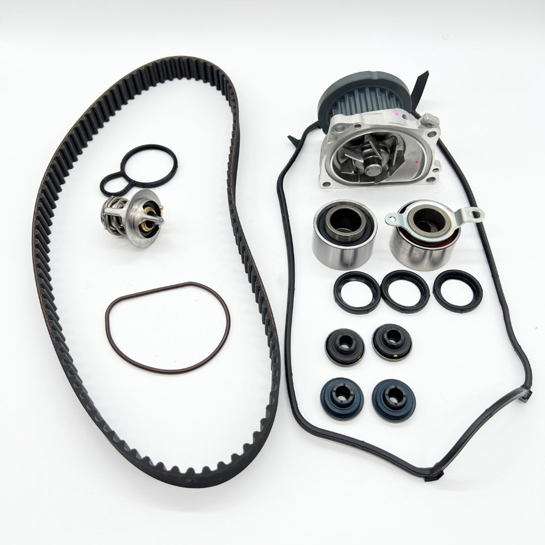 Honda Acty HH3 HH4 Timing Belt 8-Piece Kit with Water Pump, Pulleys, Seals, Thermostat, and Gasket for 1990-1999 models, expertly crafted for reliable maintenance and repair.