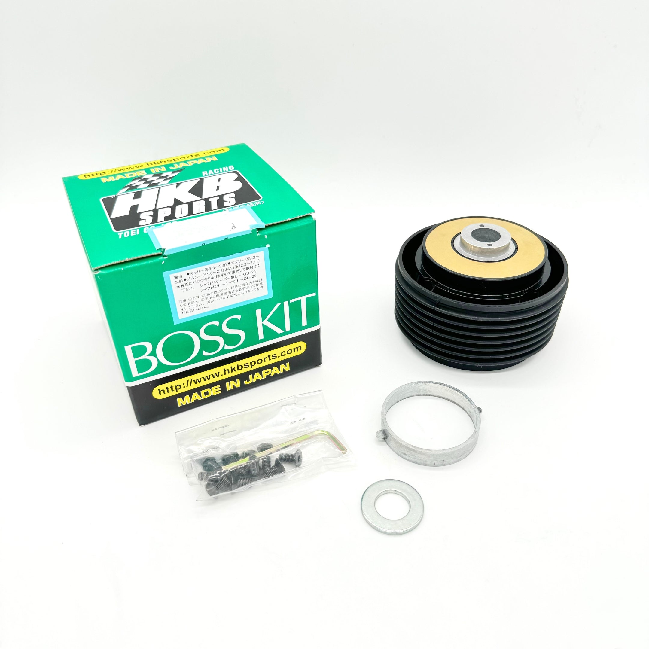 HKB Sports Boss Kit for Suzuki Carry with detailed view of the steering wheel hub adapter and included hardware