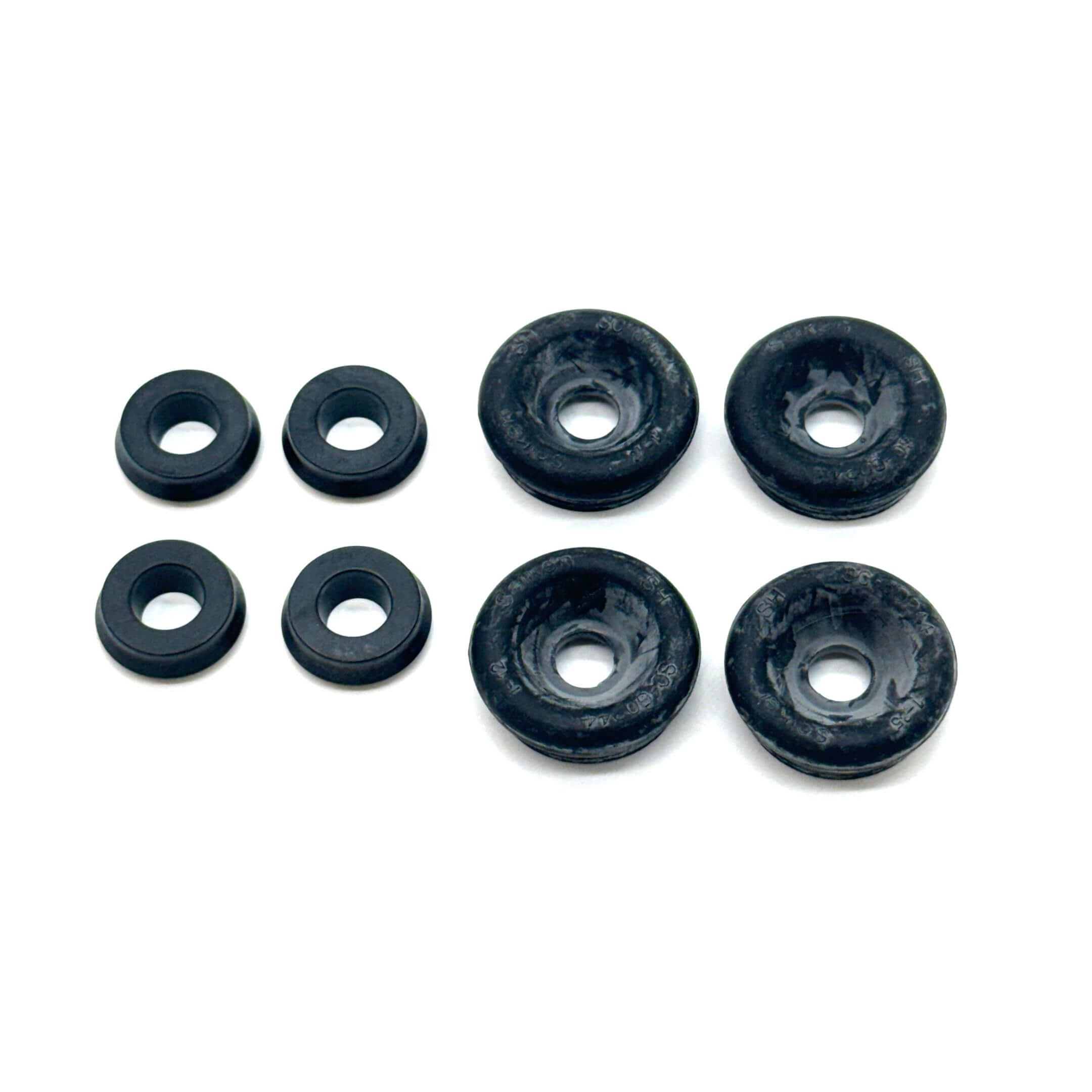 Close-up of Subaru Sambar rear brake wheel cylinder replacement kit with seals and grommets for 3/4 inch cylinders.