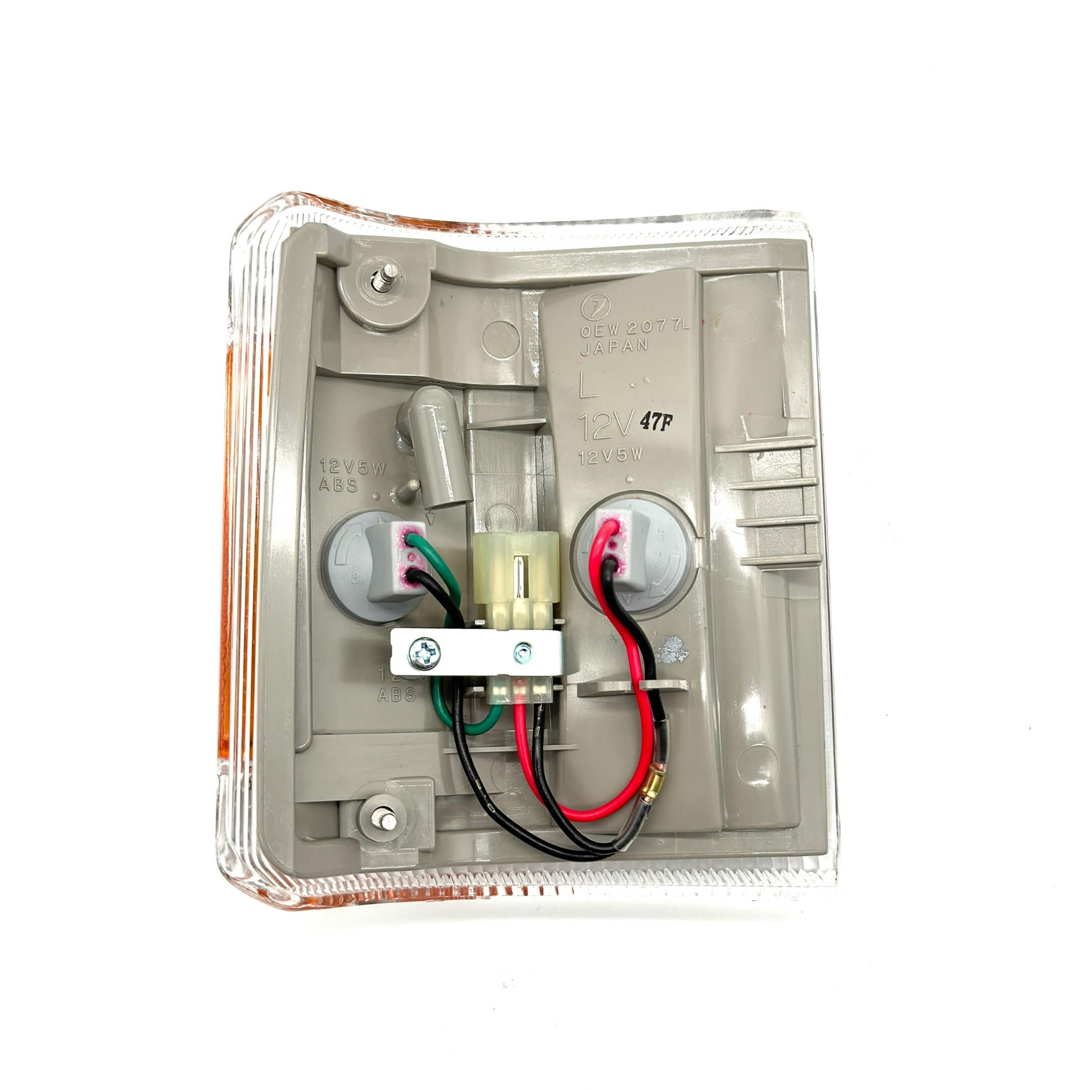 Rear view of turn signal light highlighting included wiring and mounting hardware.