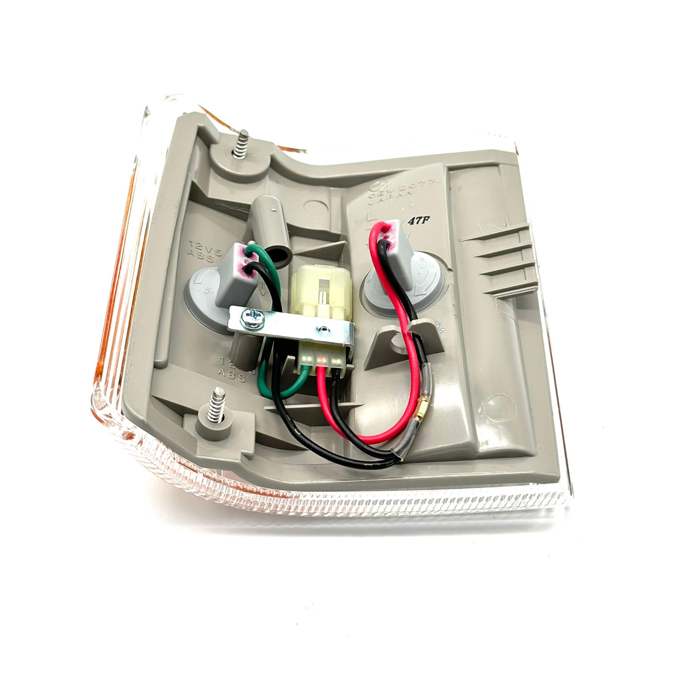 Underside of Subaru Sambar turn signal light showcasing precise fitment details.