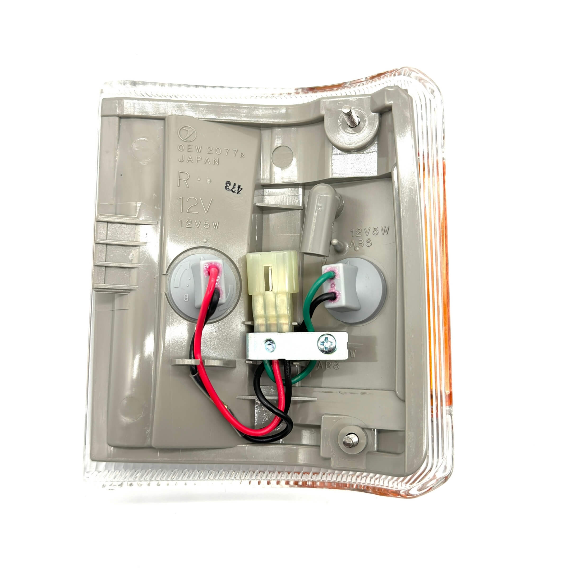 Detailed shot of Subaru Sambar Truck right turn signal housing, highlighting the amber and clear lens combination.