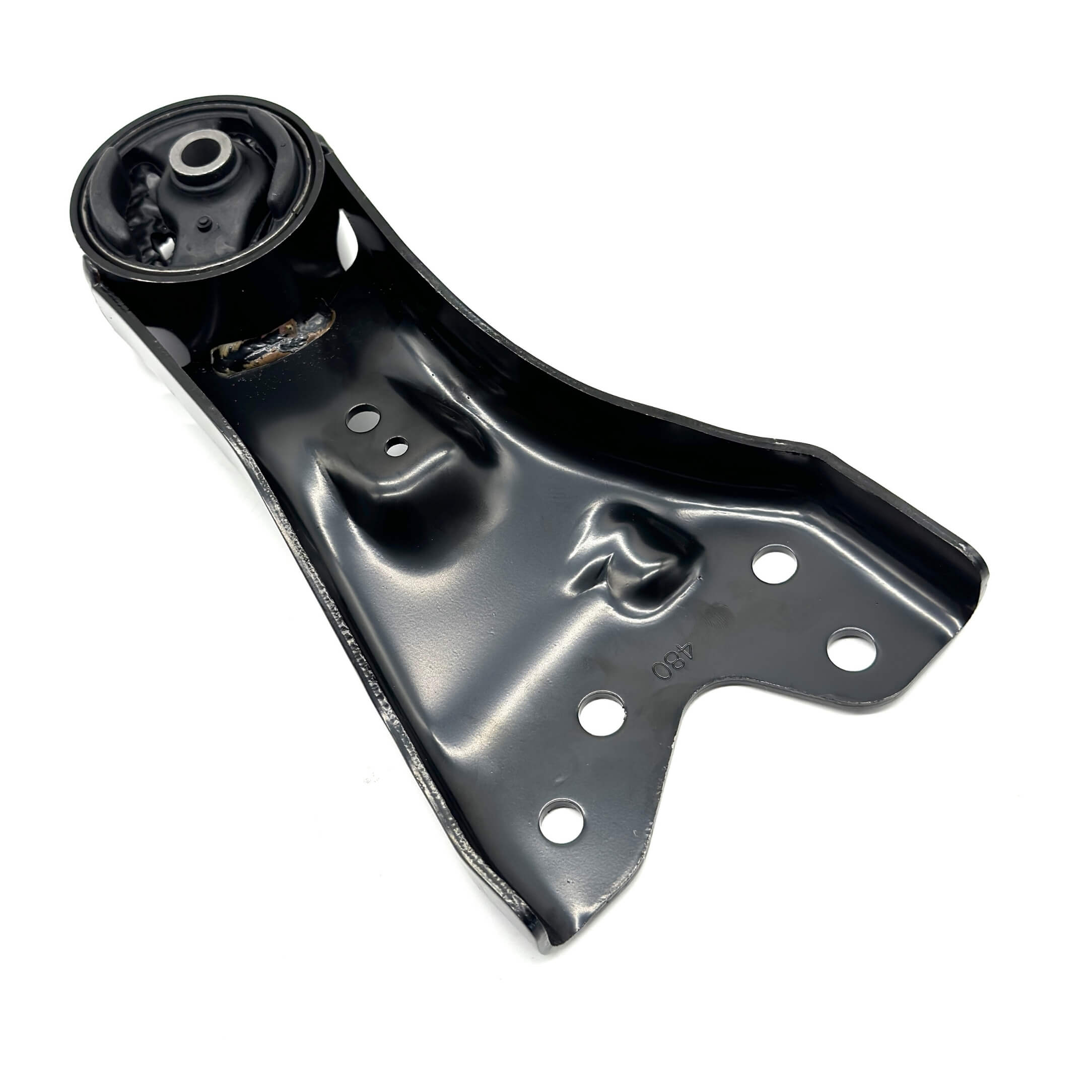 Detailed view of the Subaru Sambar front transmission mount with integrated bushings for vibration reduction.