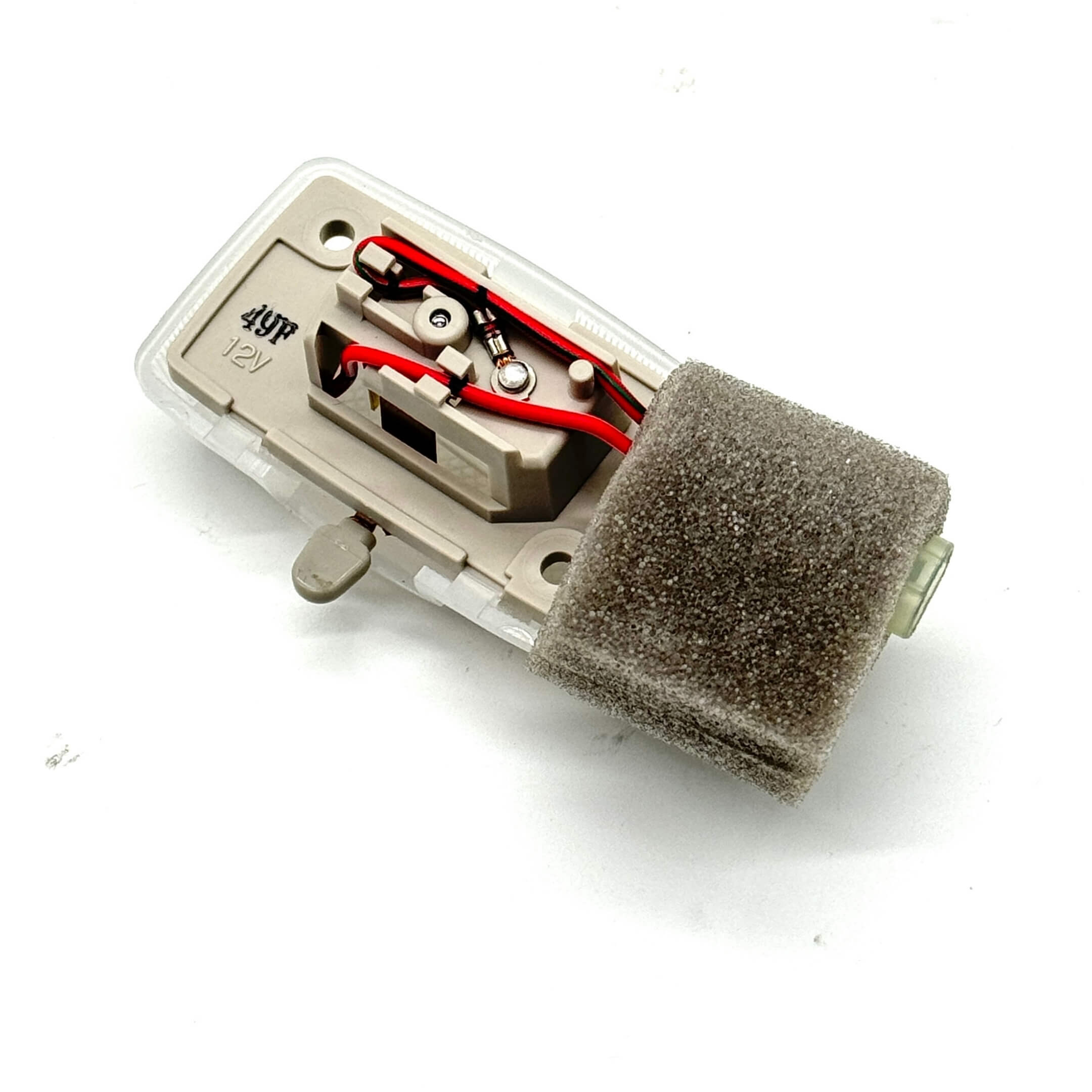 Side angle of the Dome Light Assembly with foam backing for secure installation in Subaru Sambar Vans.