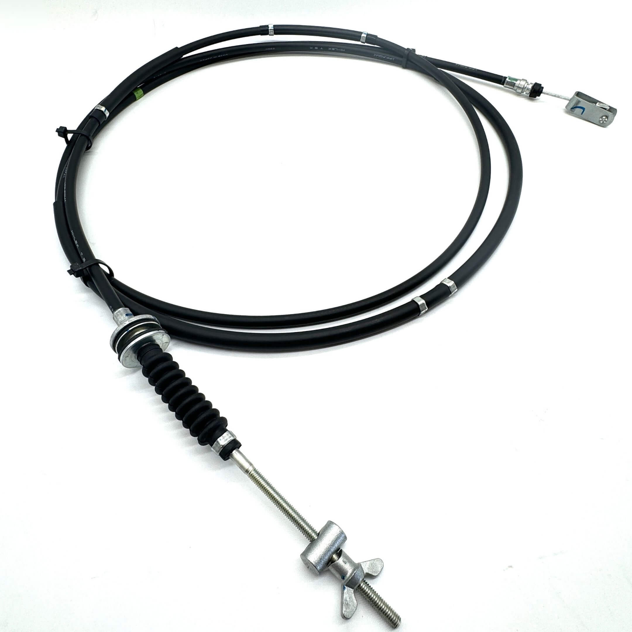 Close-up view of the Subaru Sambar Clutch Cable showing the adjustable screw and secure fittings for easy installation.