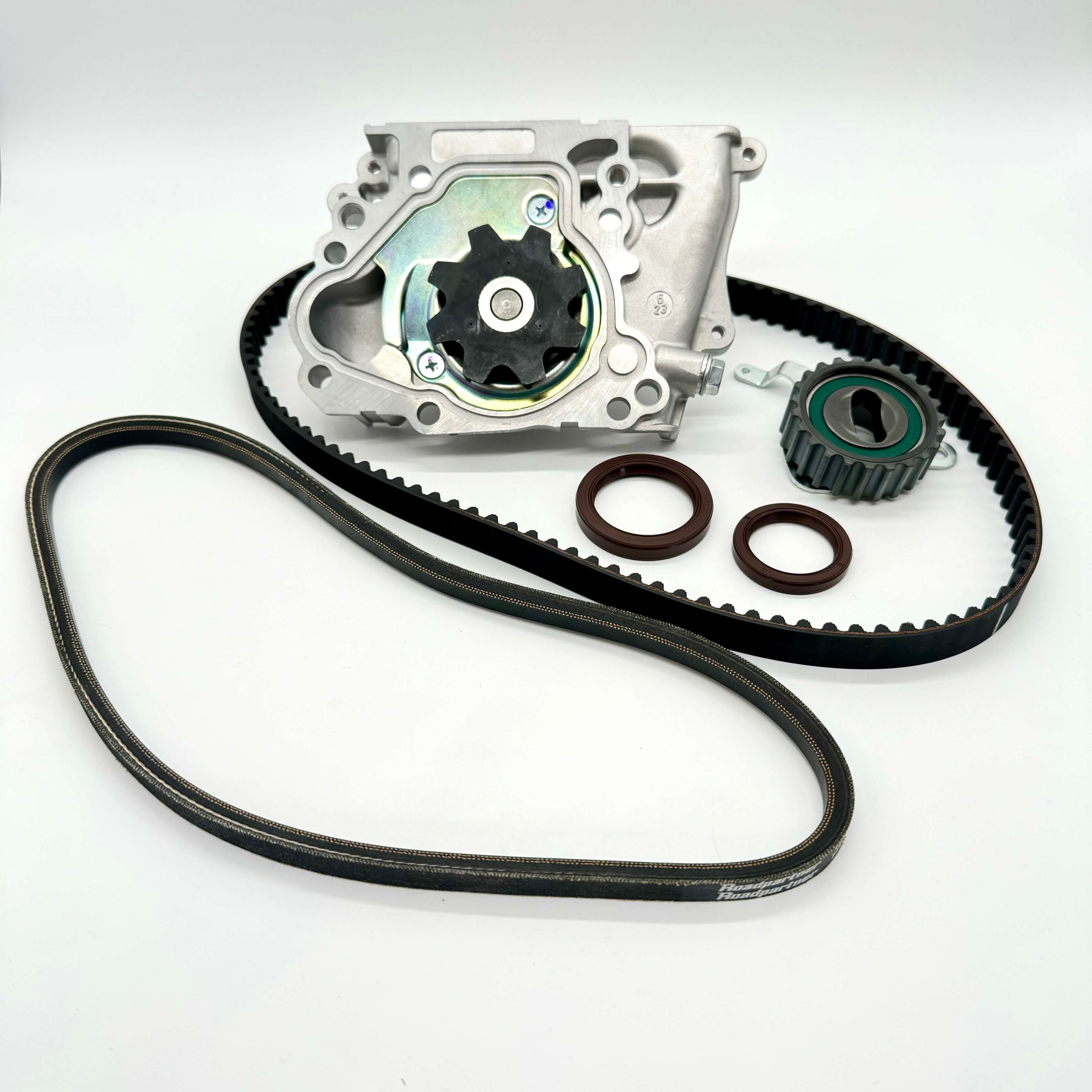 Subaru Sambar KV3 KV4 1990-1998 6-piece timing belt kit, including ribbed timing belt, cam and crank seals, tensioner pulley, water pump with gasket, and alternator belt for comprehensive engine maintenance