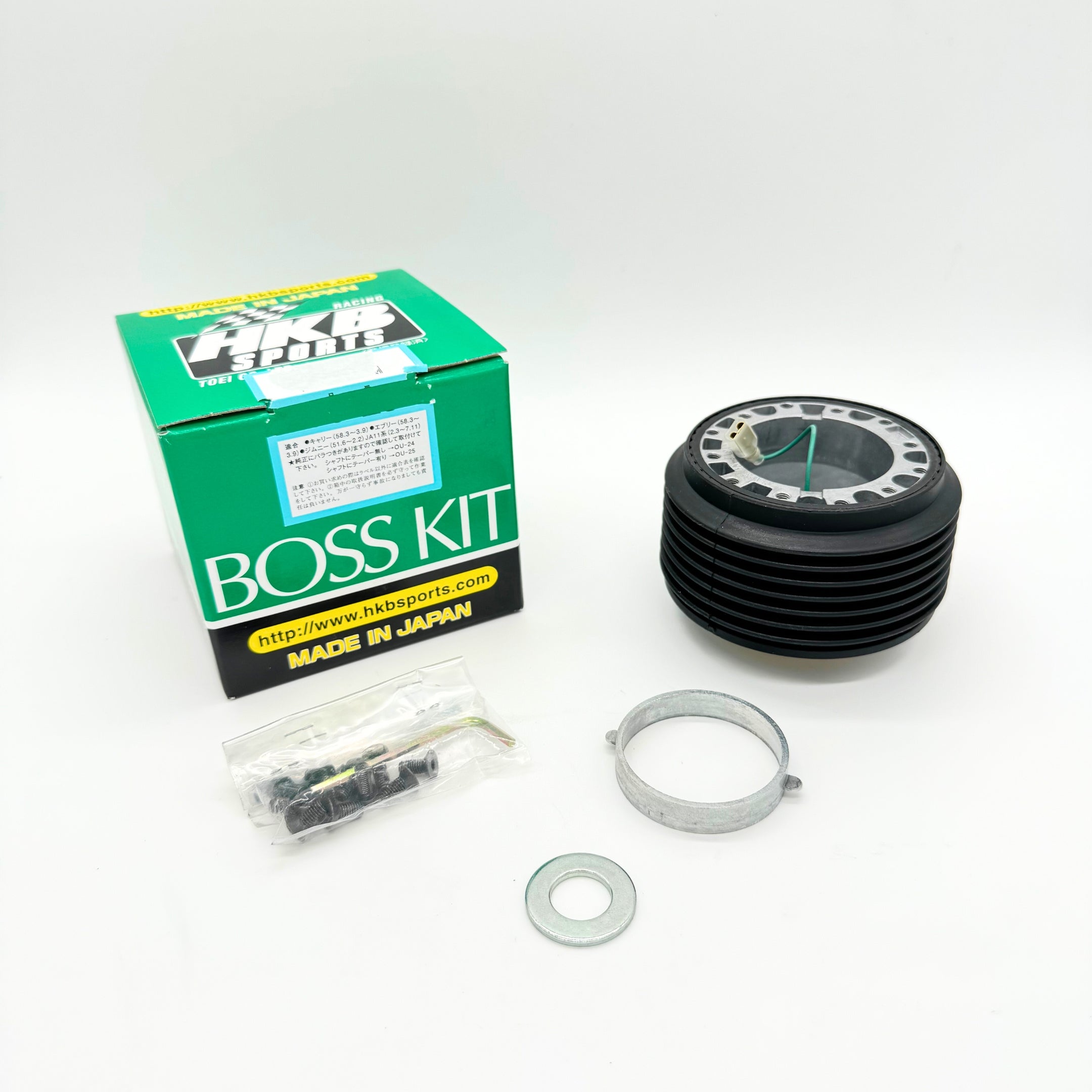 HKB Sports Boss Kit for Suzuki Carry 1990-1998, including steering wheel hub adapter, installation hardware, and box