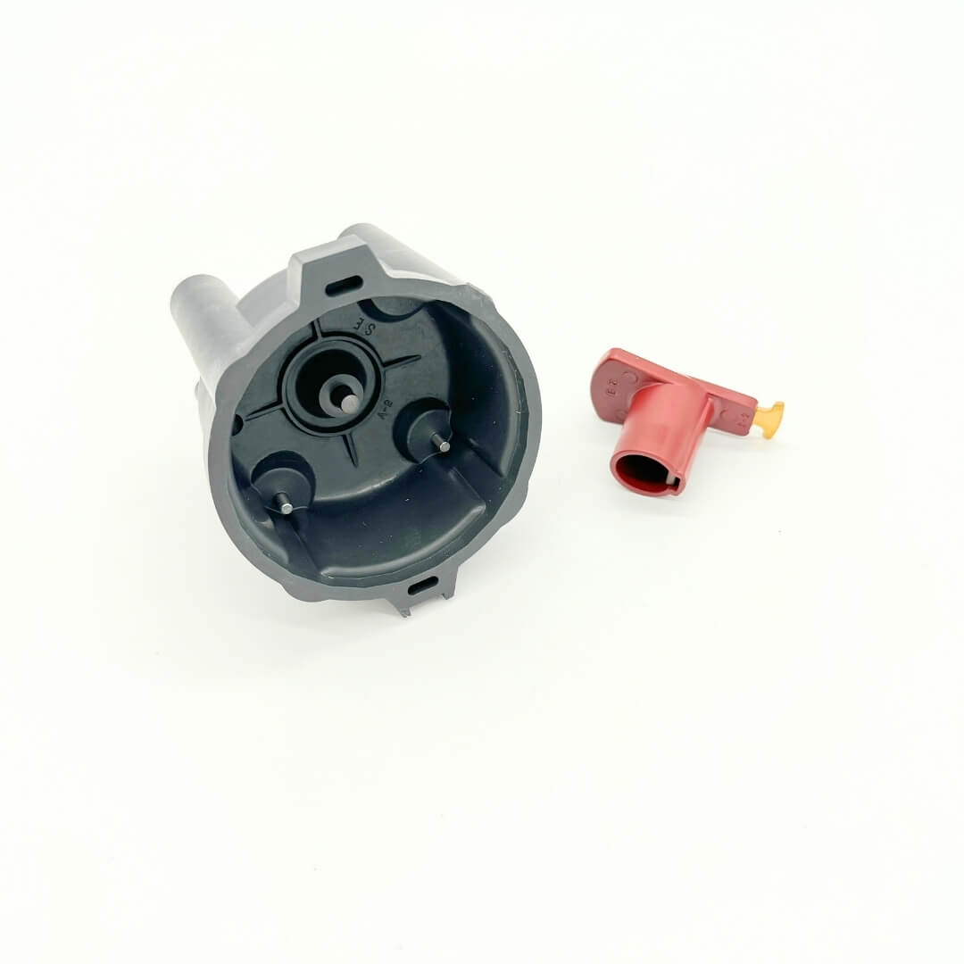 Bottom view of Subaru Sambar distributor cap with rotor, 2-piece ignition kit for 1990-1998 KV3/KV4 models, high-quality components, available at Oiwa Garage.