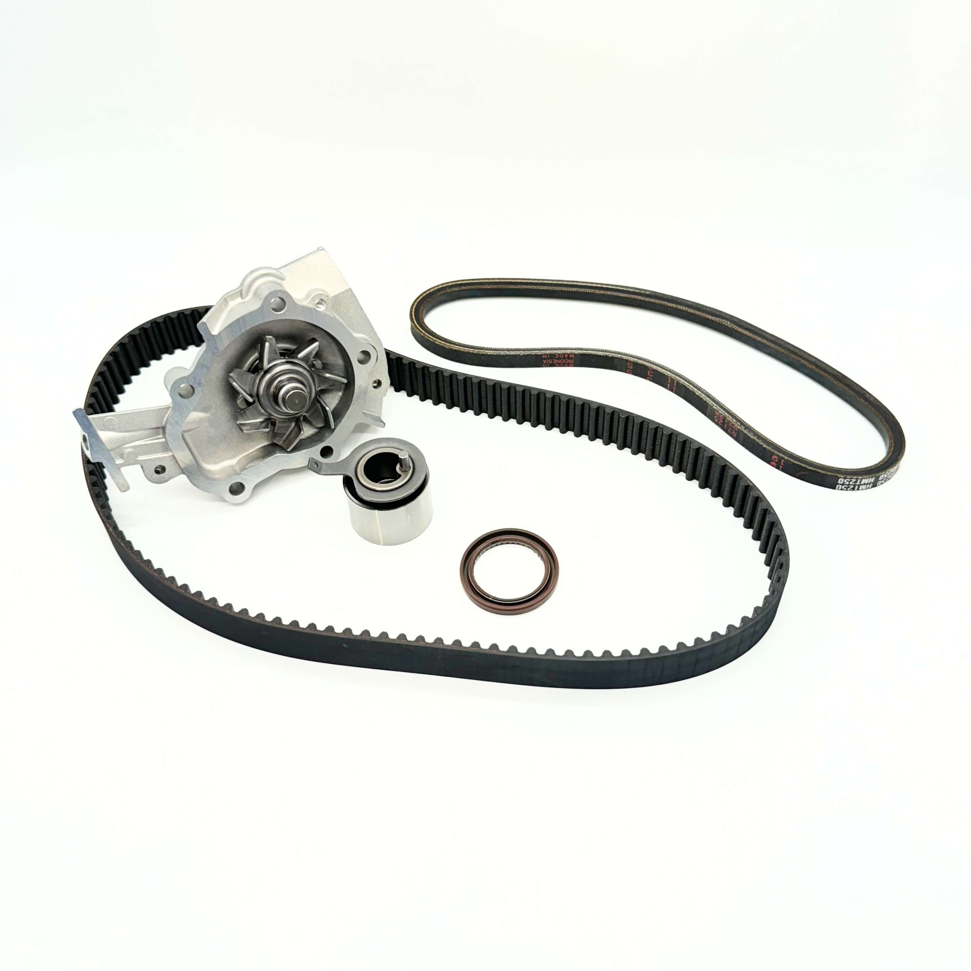 5-piece Timing Belt Kit for Suzuki Carry DC51T and DD51T (1991-1998), including timing belt, alternator belt, water pump, pulley, and cam seal. Comprehensive solution for engine repair and maintenance.