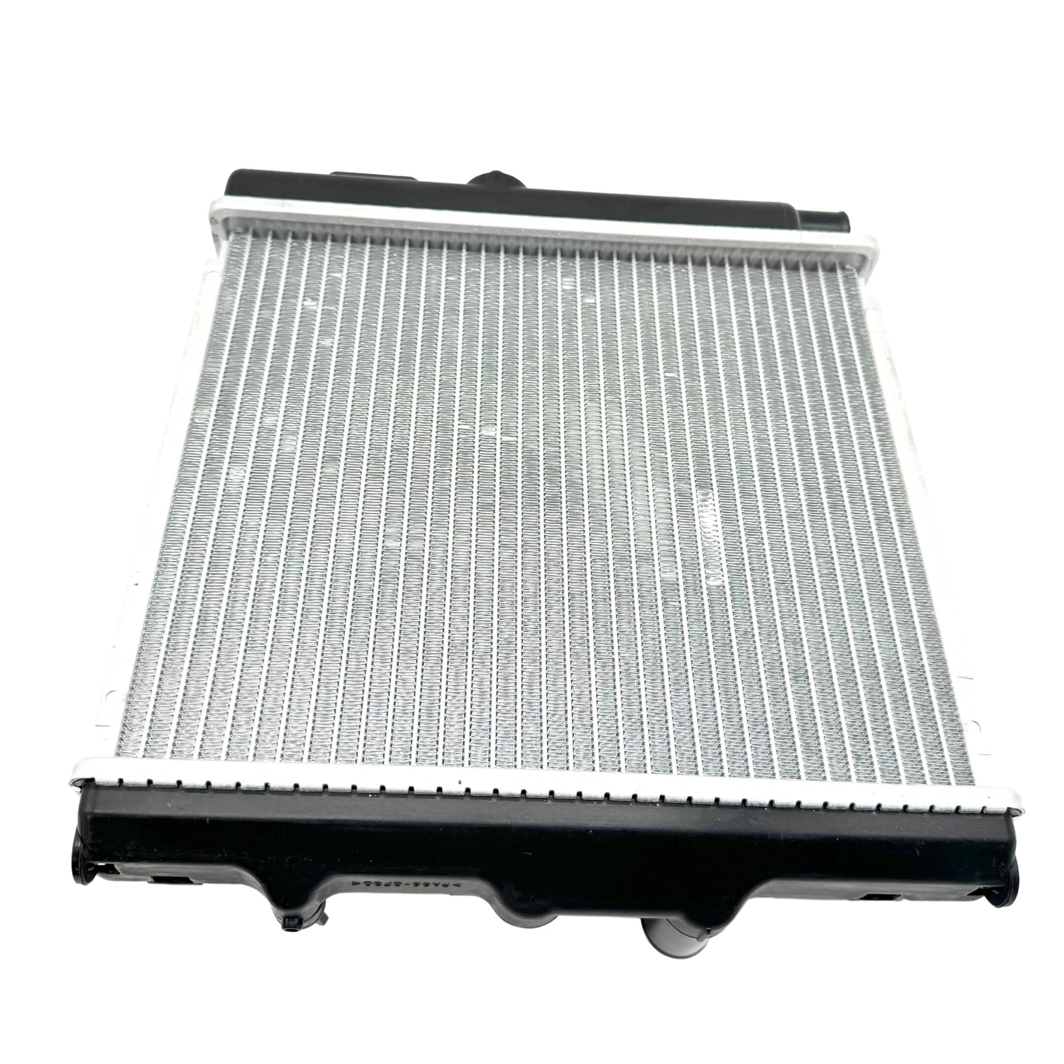 Top down view of a lightly used radiator for Honda Acty HA3, HA4, emphasizing the well-preserved core and cap details.