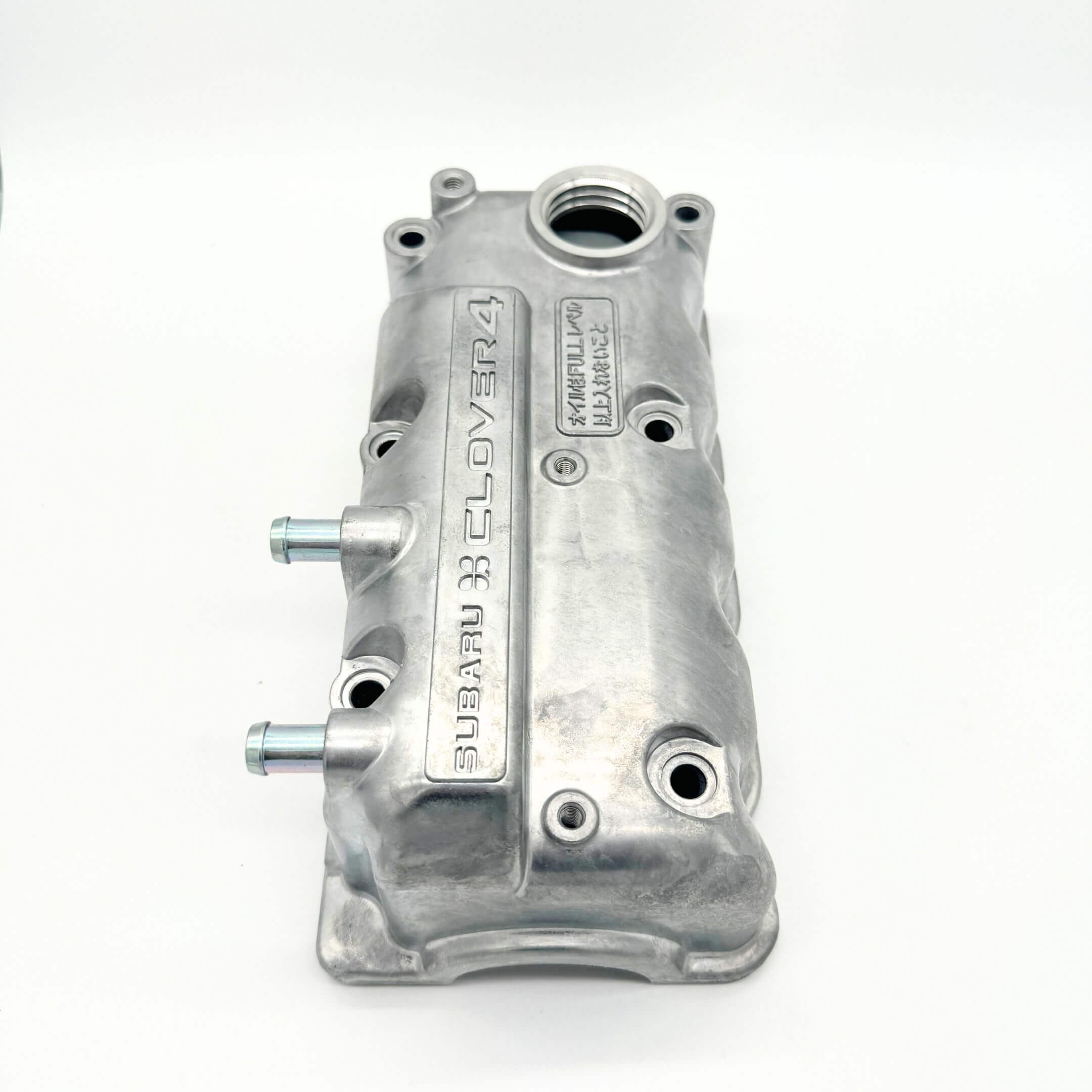 Angled side view of Subaru Sambar Truck KS3, KS4 Valve Cover focusing on hose connections and oil cap area - 1990-1999