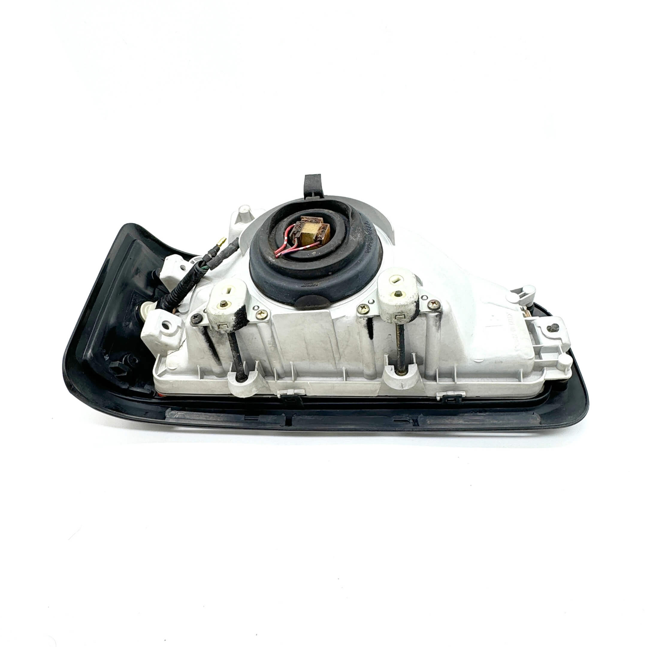 Detailed rear view of Left Headlight Assembly for Honda Acty Van HH3, HH4 models (1990-1993) showing wiring harness and connectors