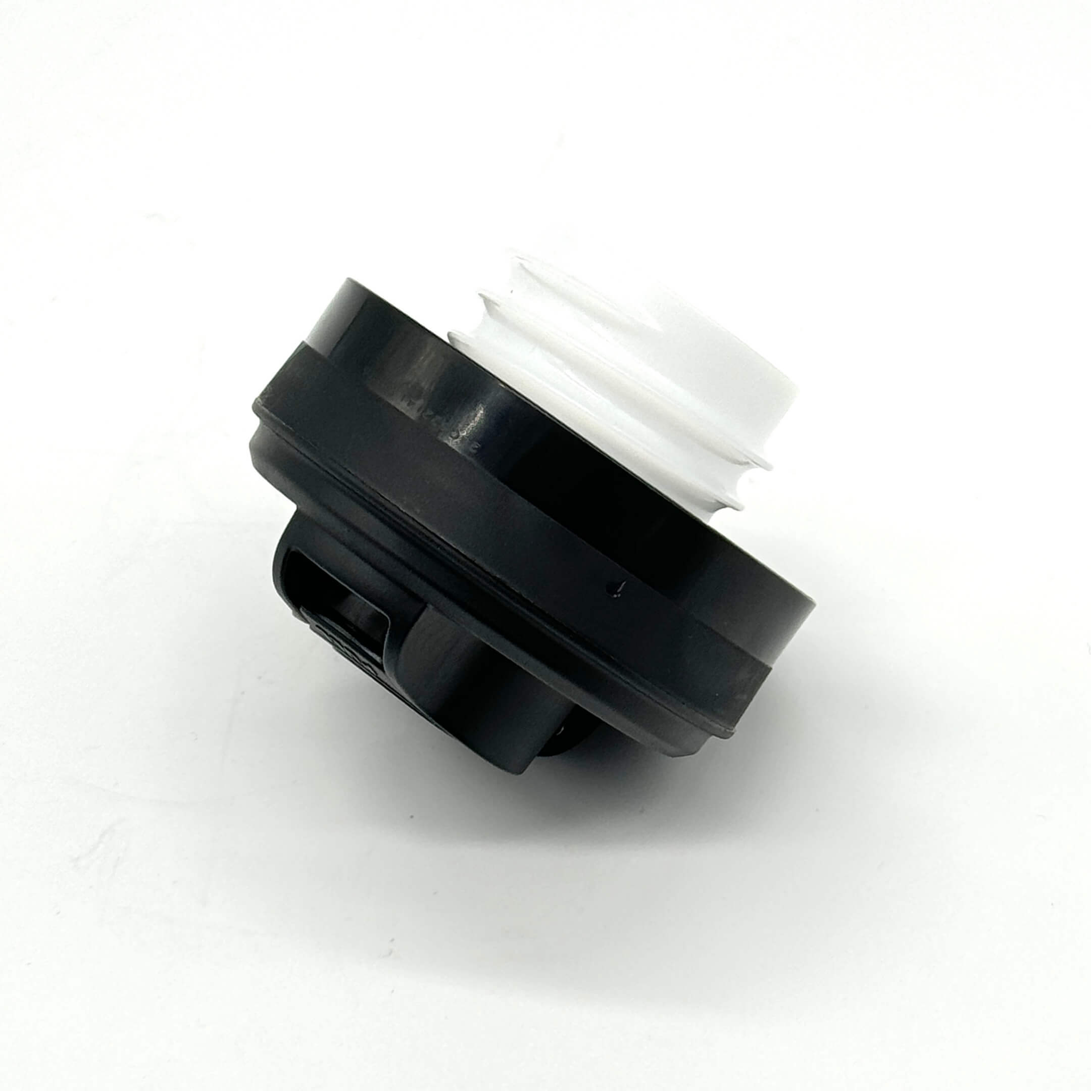 Black and white fuel cap for Honda Vamos Van HM1, HM2 models, 1999-2018, featuring a secure locking mechanism.