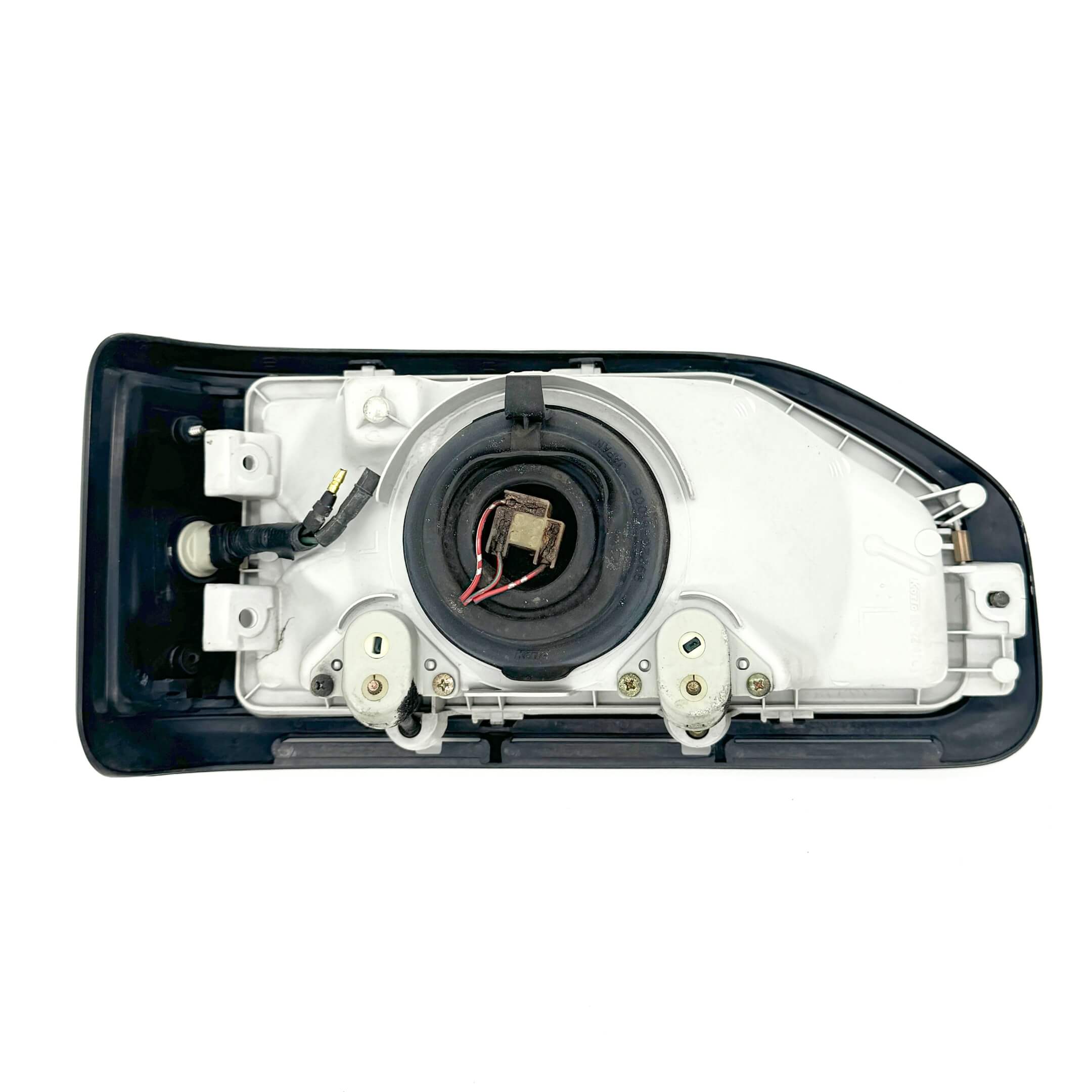 Detailed rear view of Left Headlight Assembly for Honda Acty Van HH3, HH4 models (1990-1993) showing wiring harness and connectors