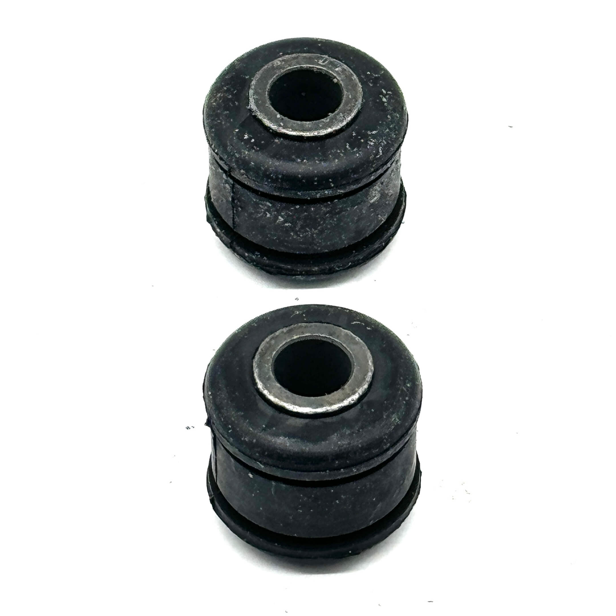 Black rear shock bushing for Honda Acty Van HH5, HH6 models, 1999-2009, featuring durable rubber construction.