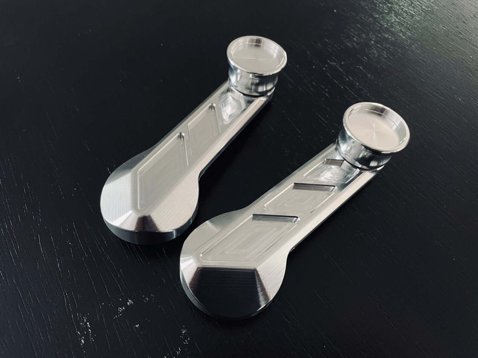 Sleek 6061 aluminum window crank handles for Honda Acty Van HH1-HH4 models, with symmetrical Lusso Design and 3D surface finish, perfect for 1988-1999 upgrades.