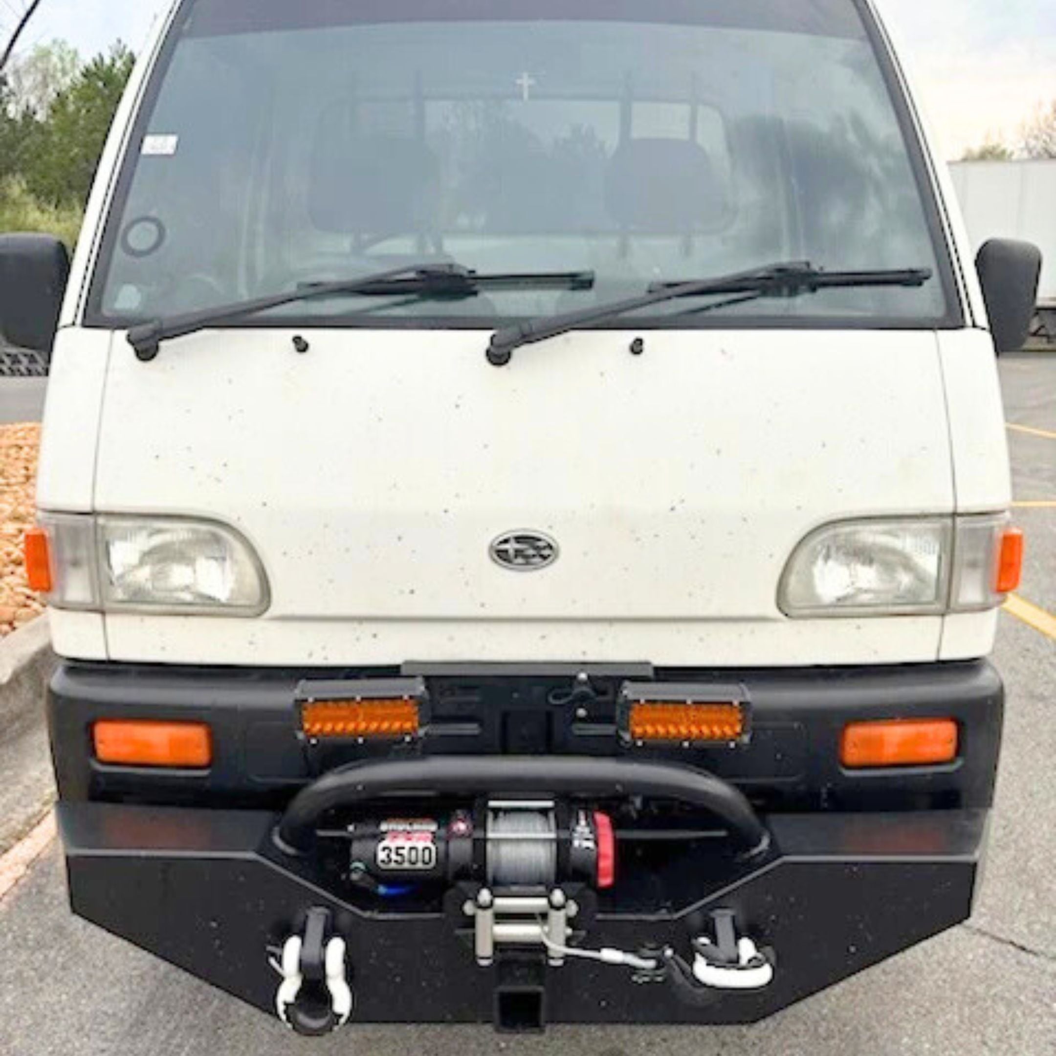 Subaru Sambar KS4 with Armor Front Bumper featuring bullbar light mounts and shackle points.