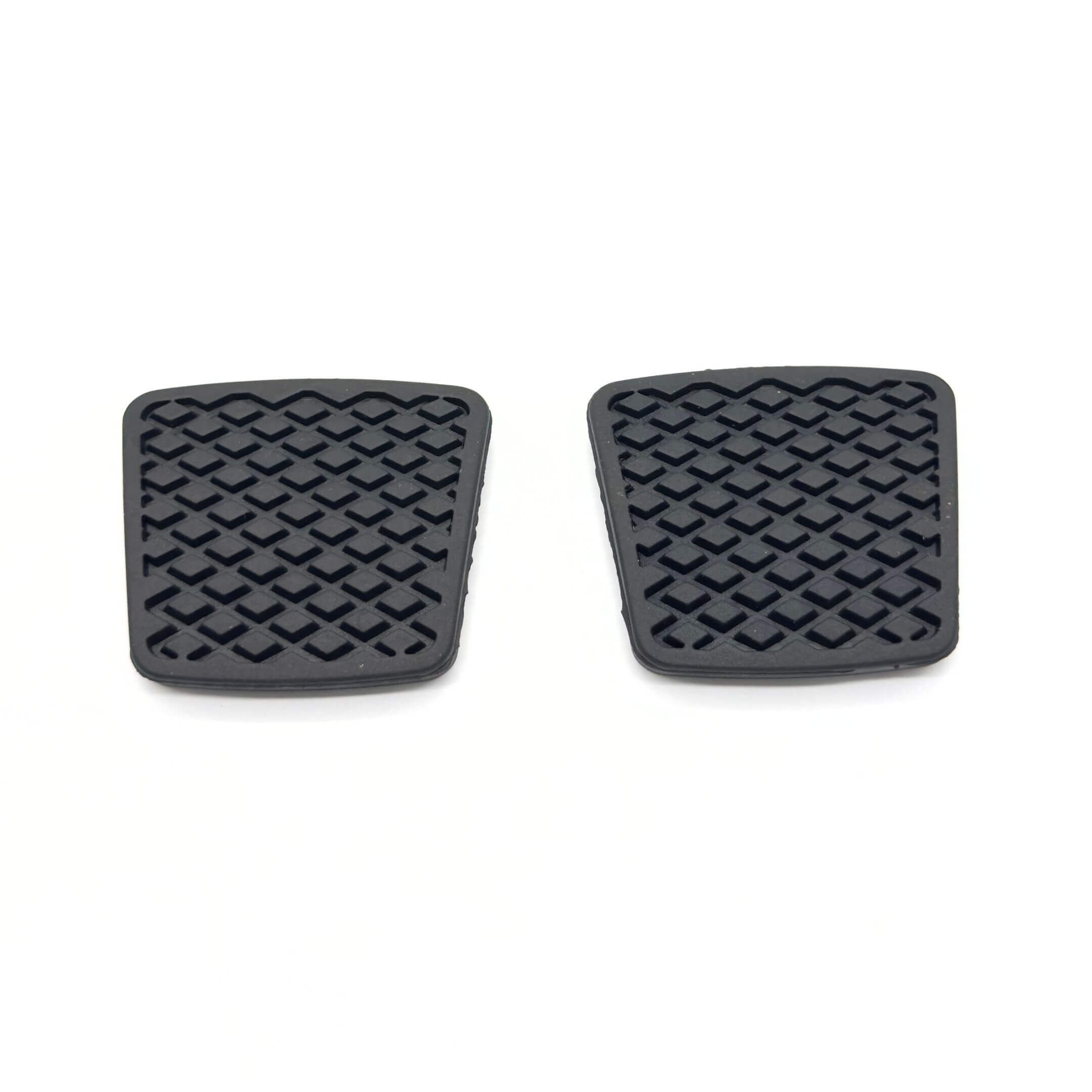 Black clutch and accelerator pads for Subaru Sambar Truck TT1, TT2 models (1999-2012), featuring a textured surface for enhanced grip.