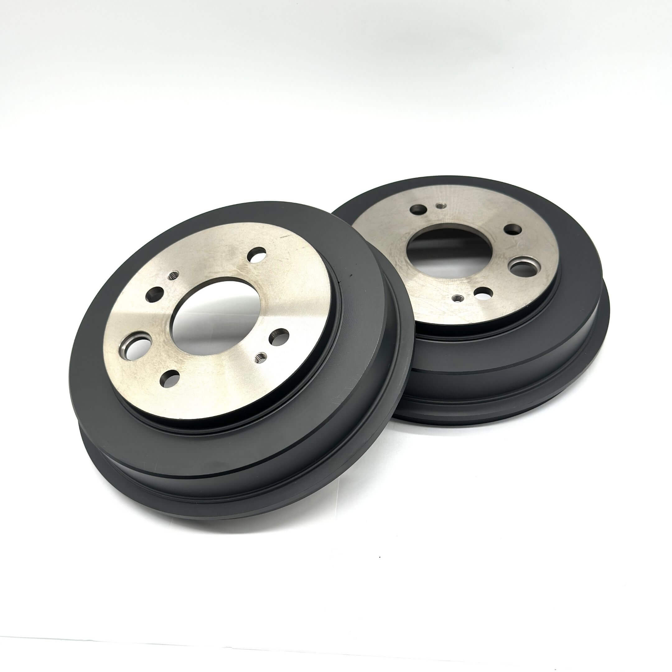 Subaru Sambar Truck TT1, TT2 Models 1999-2012 drum brakes, right and left, featuring a sleek black and silver design.