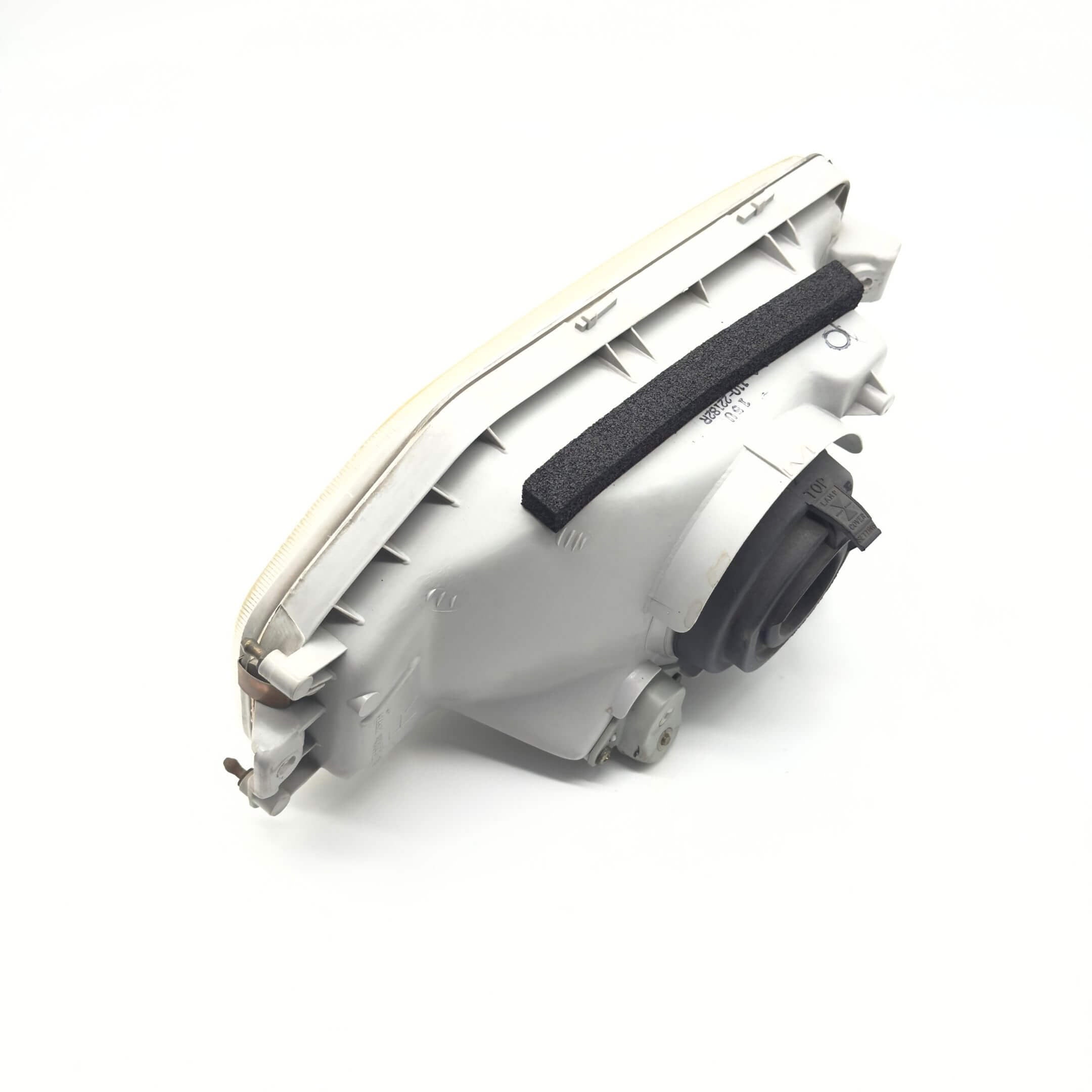 Headlight - Right / Driver Side for Honda Acty Truck Models HA3, HA4 (1990-1993) featuring a durable white housing and black rubber seal.