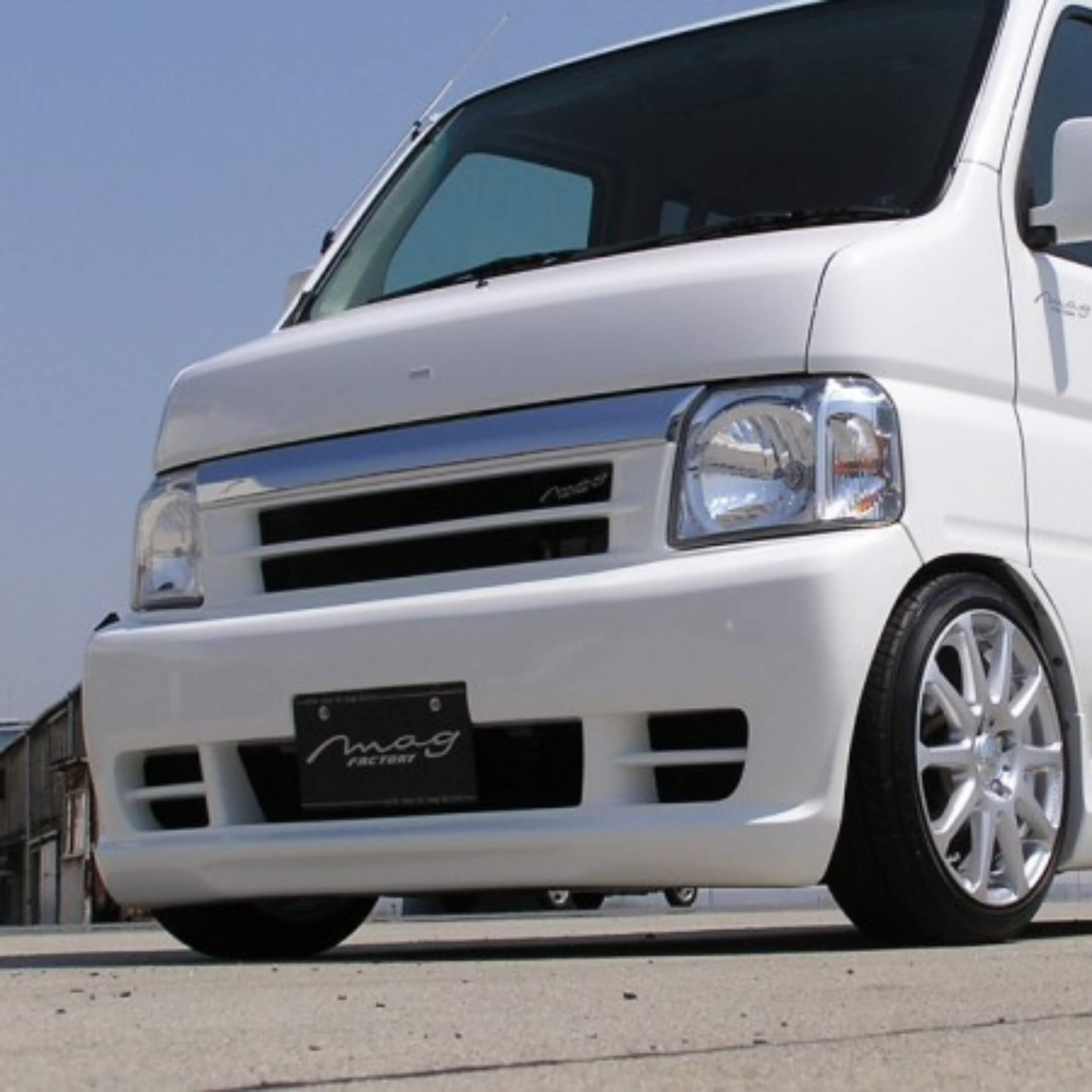Honda Acty Van Body Kit Front Bumper for HH5, HH6 Models 1999-2009 in sleek white with aerodynamic design.