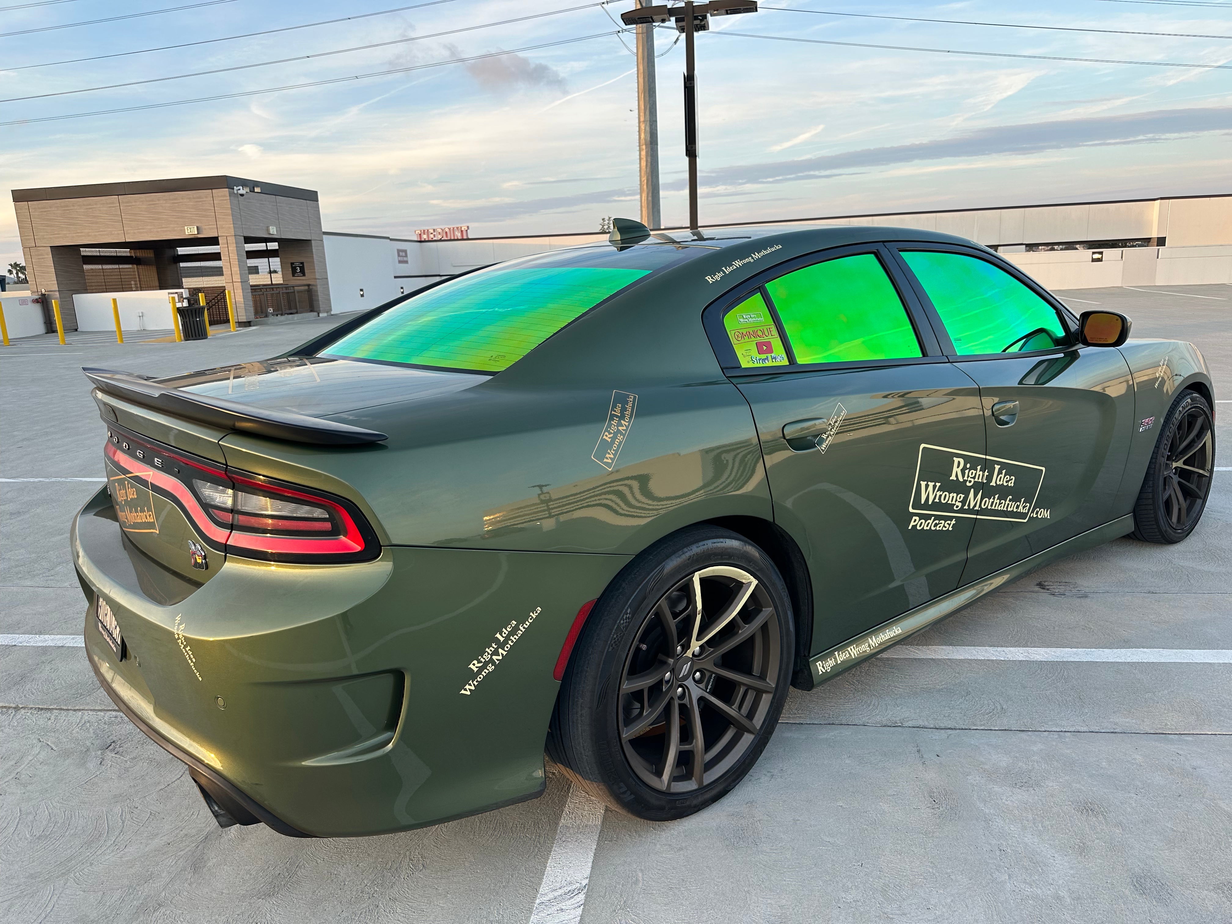 Dodge Charger with Omnique Aurora Colorshift Window Tint - Green and Yellow Shift.