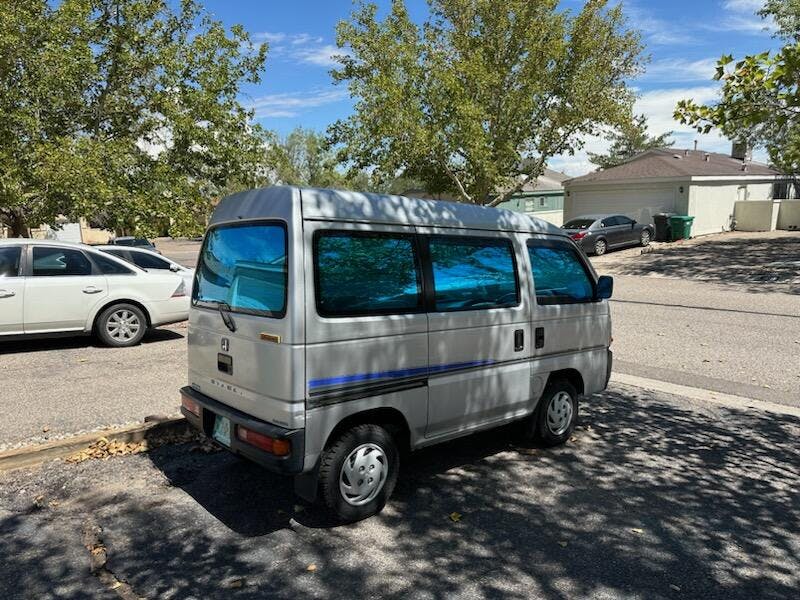 Honda Acty Kei Van with Omnique Design Bellagio Blue tint on the windows, ensuring UV protection and a stylish finish.