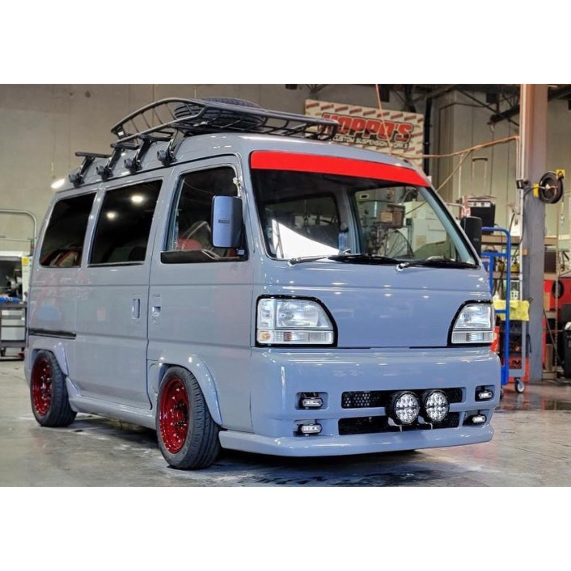 Close‑up of Mag Factory Fender Flares on a 1992–1999 Honda Acty Van, demonstrating the bolt‑on installation, smooth paint‑ready finish, and enhanced protection against road debris.