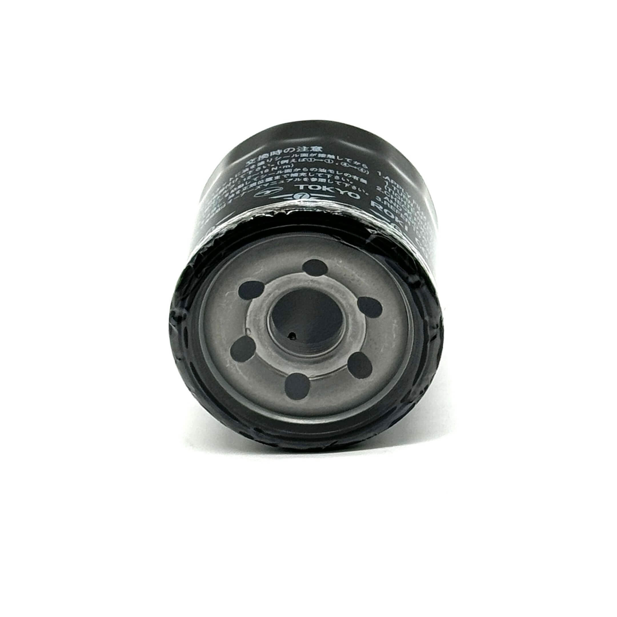 Black genuine oil filter for Subaru Sambar Wagon TW1, TW2 models (1999-2012), featuring a durable metal casing and multiple inlet holes.