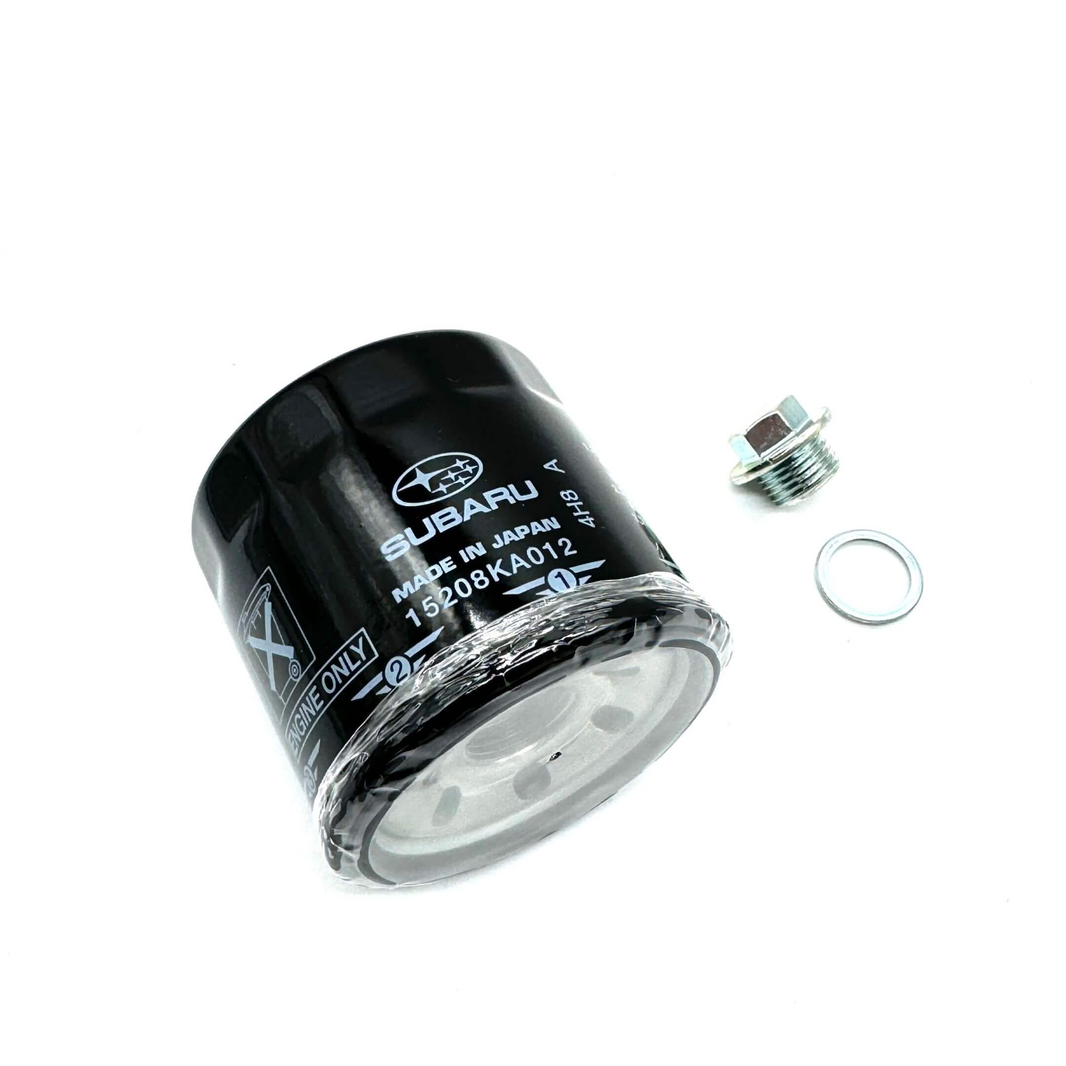 Genuine Subaru Sambar Truck TT1, TT2 oil filter and drain plug set, black, compatible with 1999-2012 models.