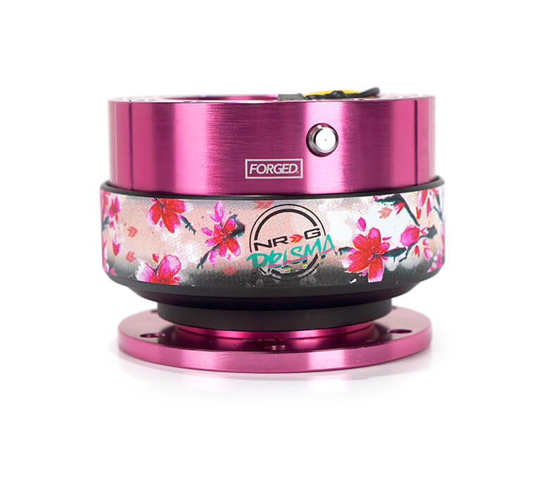 NRG Quick Release Adapter Pink Body with Sakura Ring and Prisma Collab - Gen 2.0 SRK-200PK-SAK, featuring a vibrant pink design with floral Sakura accents, high-quality build, and ergonomic installation for Japanese mini trucks