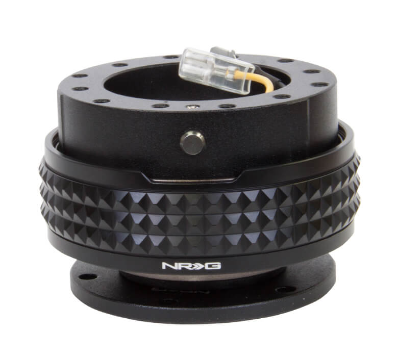 NRG Quick Release Adapter Black Body with Black Pyramid Ring - 2.1 Pyramid Series SRK-210BK-BK, featuring a sleek black design with textured pyramid pattern, high-quality build, and ergonomic installation for Japanese mini trucks