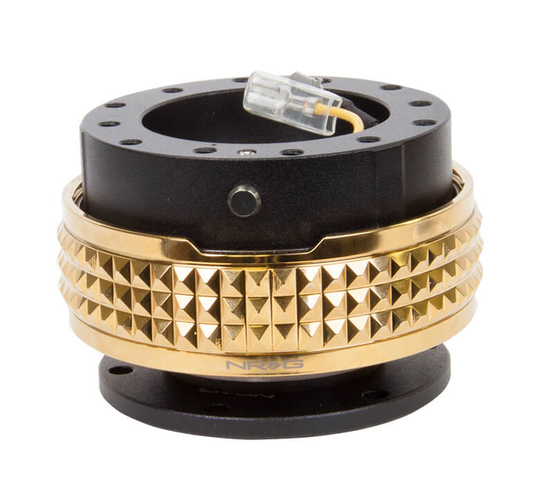 NRG Quick Release Adapter Black Body with Chrome Gold Pyramid Ring - 2.1 Pyramid Series SRK-210BK-CG, featuring a sleek black design with a striking gold pyramid pattern, high-quality build, and ergonomic installation for Japanese mini trucks