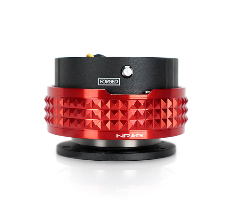 NRG Quick Release Adapter Black Body with Red Pyramid Ring - 2.1 Pyramid Series SRK-210BK-RD, featuring a sleek black design with a vibrant red pyramid pattern, high-quality build, and ergonomic installation for Japanese mini trucks
