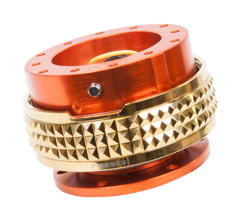 NRG Quick Release Kit Orange Body with Chrome Gold Pyramid Ring - 2.1 Pyramid Series SRK-210OR-CG, side view showcasing premium construction and unique chrome gold pyramid texture for enhanced grip and style